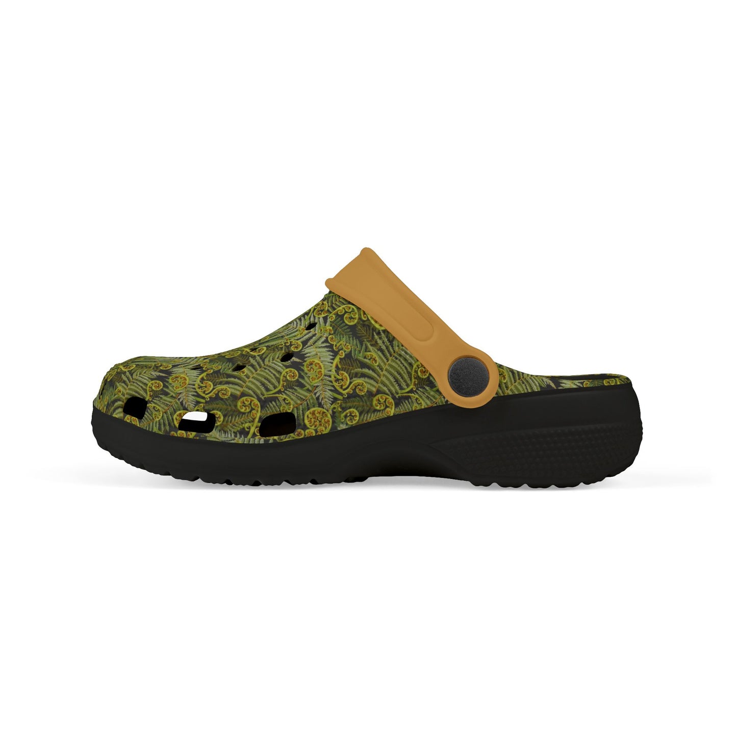 Slip-on clogs with green patterned upper and tan top panel on black outsole