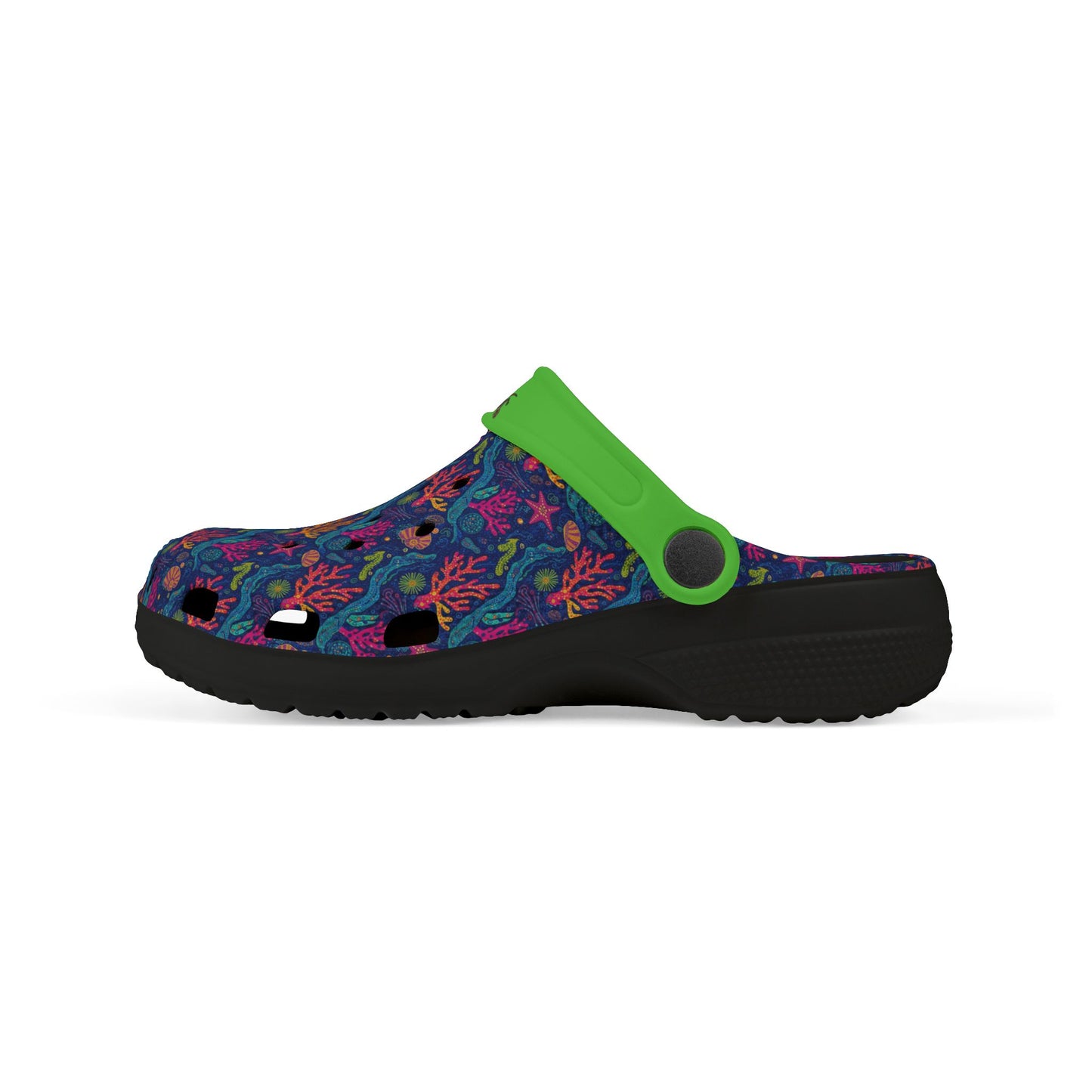 Lateral view of coral-printed clog with green strap and thick black sole.