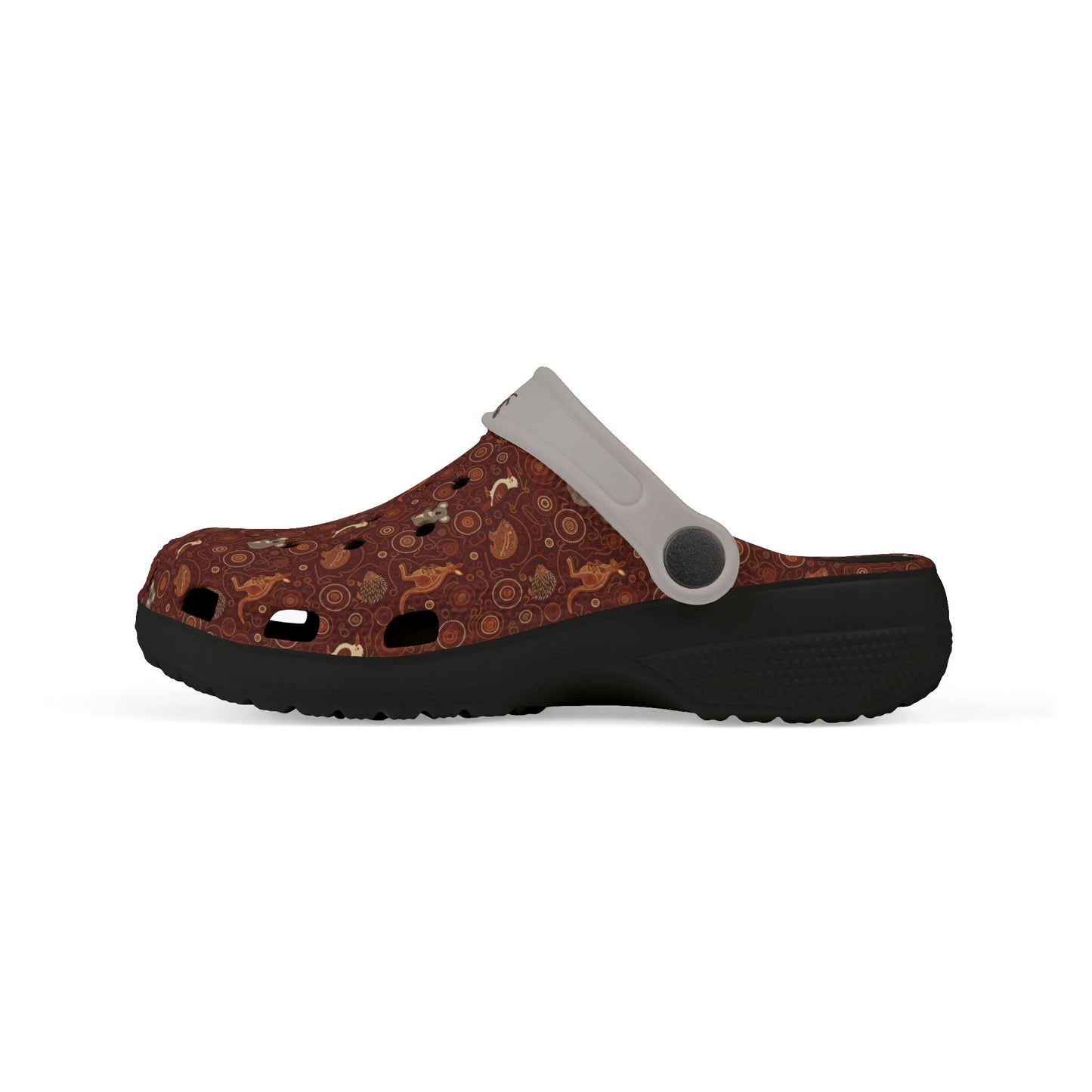 Printed casual clog shoes side view with black outsole and maroon-brown vented upper.