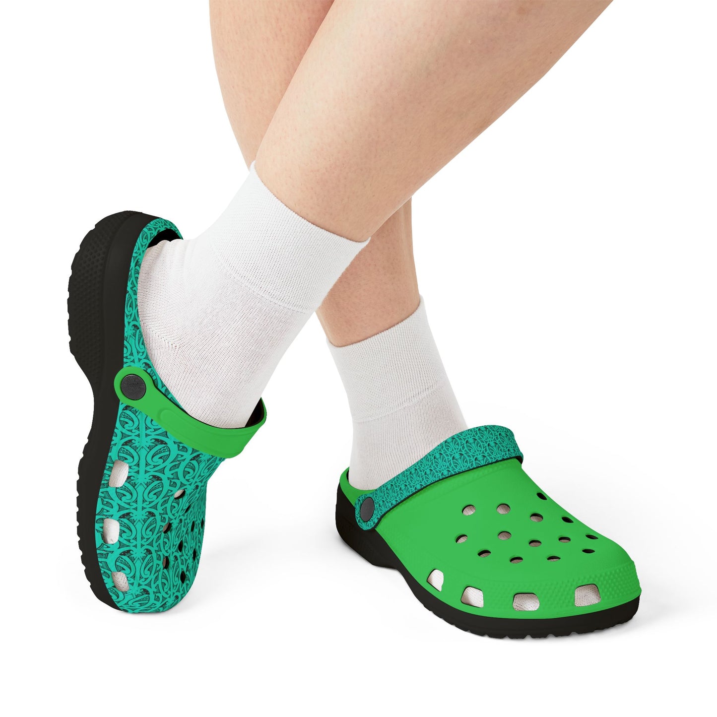 Green and teal clogs with perforated toe vents, black outsole, and heel strap