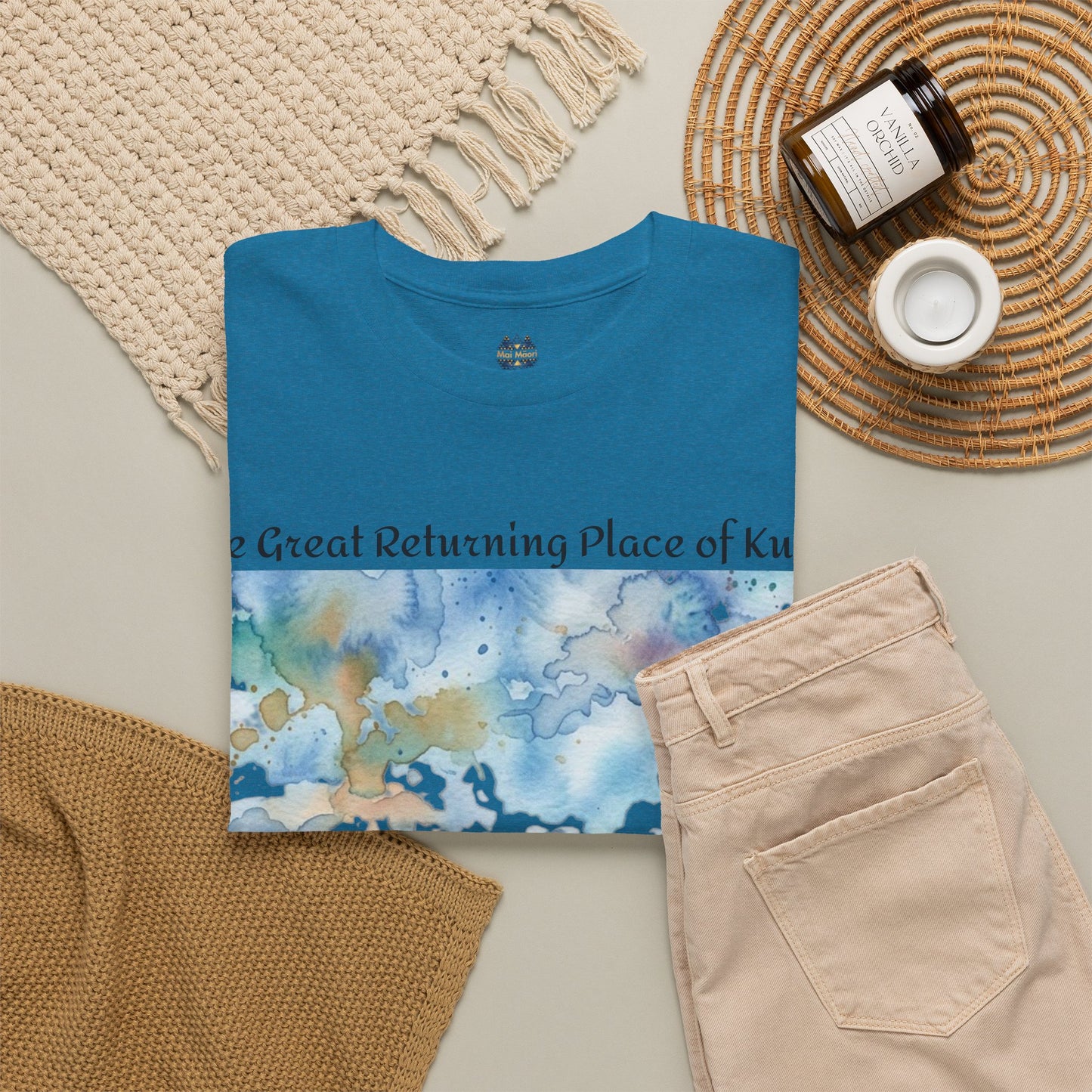 Teal graphic T-shirt with landscape print, crew neck, and small chest logo