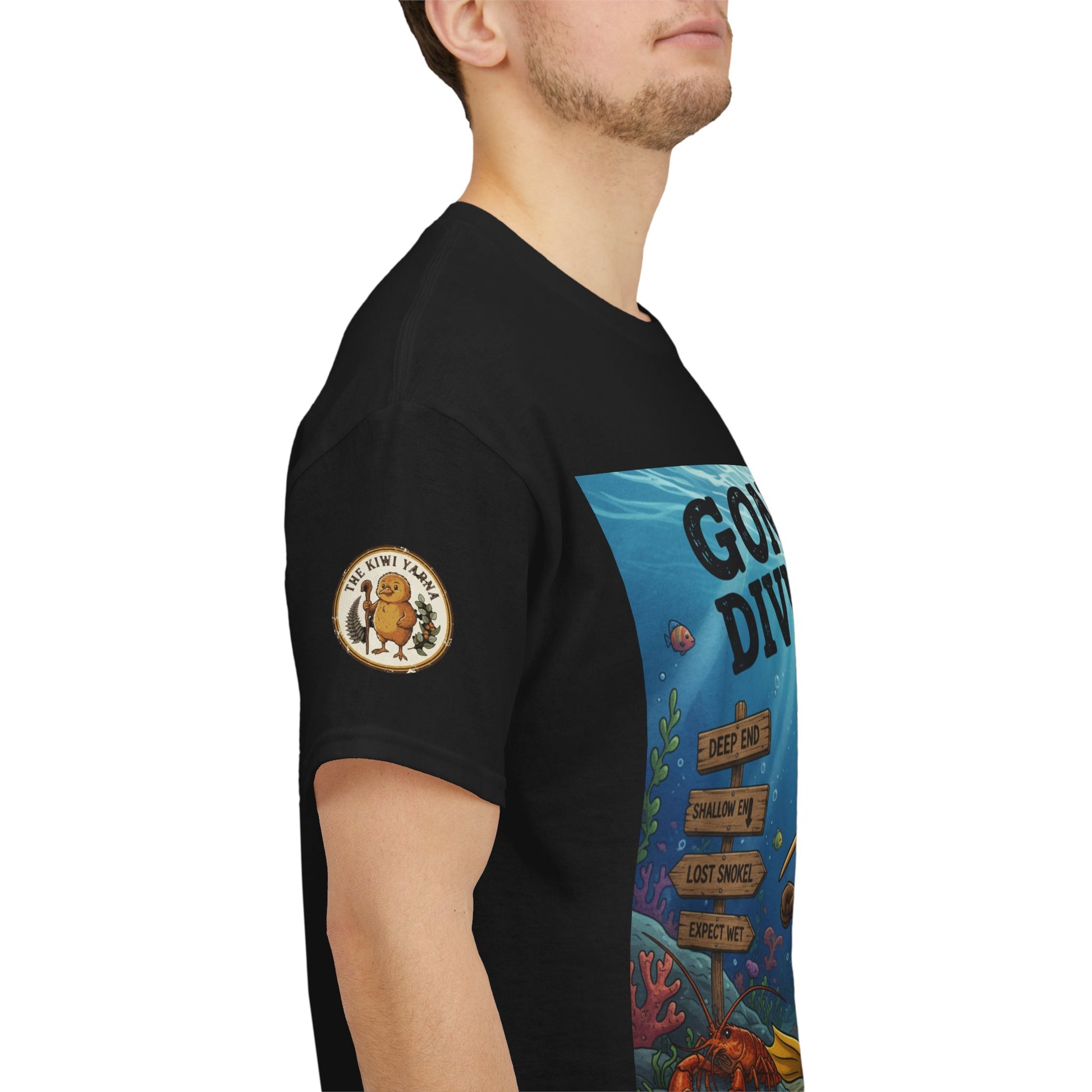 Black crew-neck T-shirt with round sleeve emblem and side “Gone Diving” underwater graphic