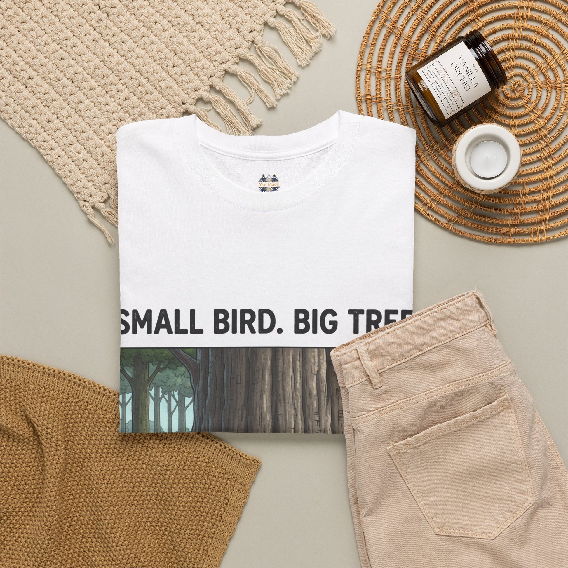 White T-shirt with small chest emblem and large forest graphic illustration