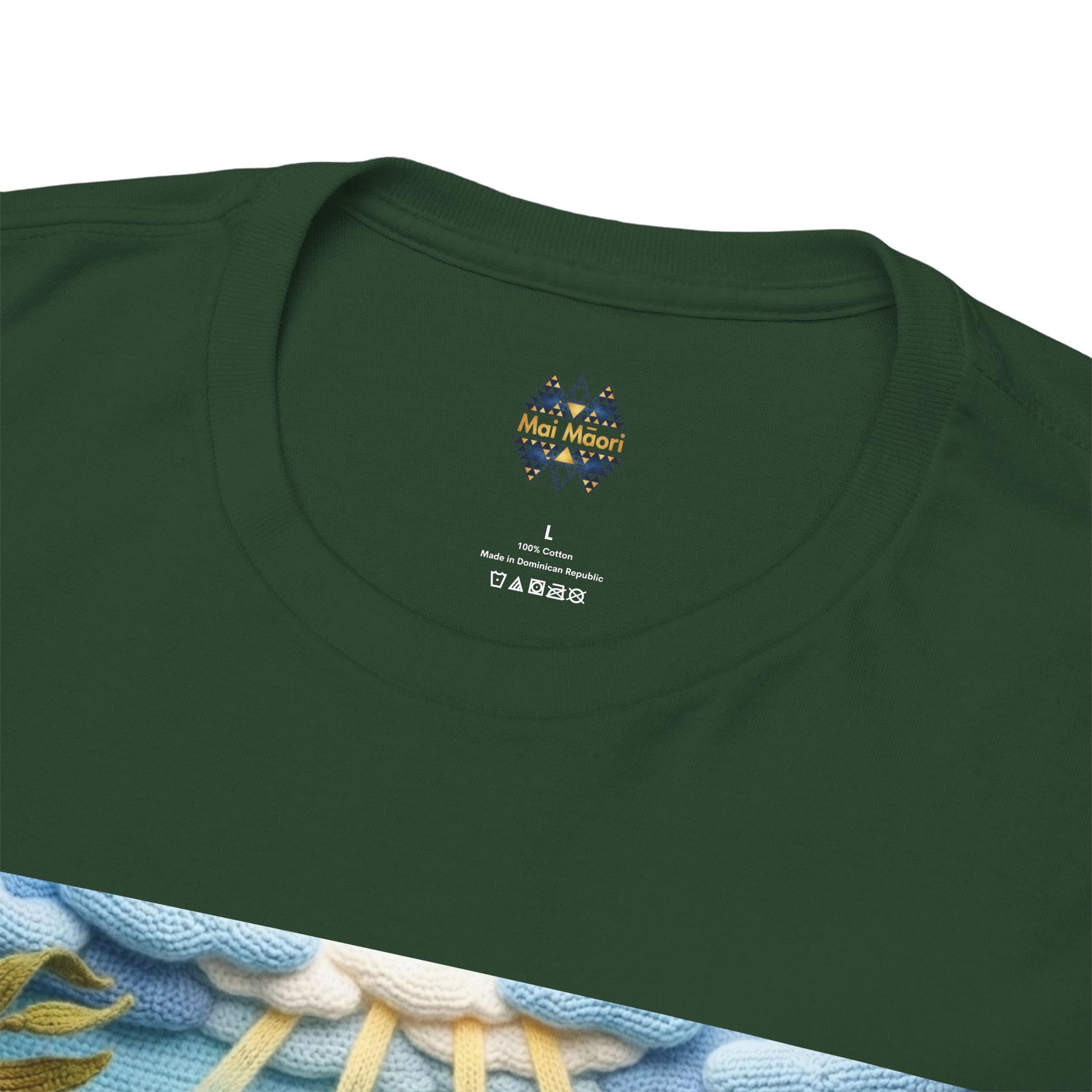 Dark green T-shirt neckline with small chest logo and care label beneath