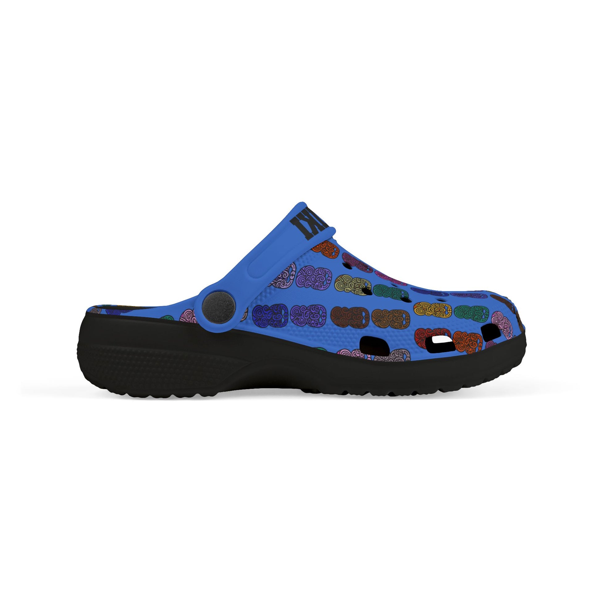 Kids casual clog shoes on feet with white socks; blue colorful patterned upper