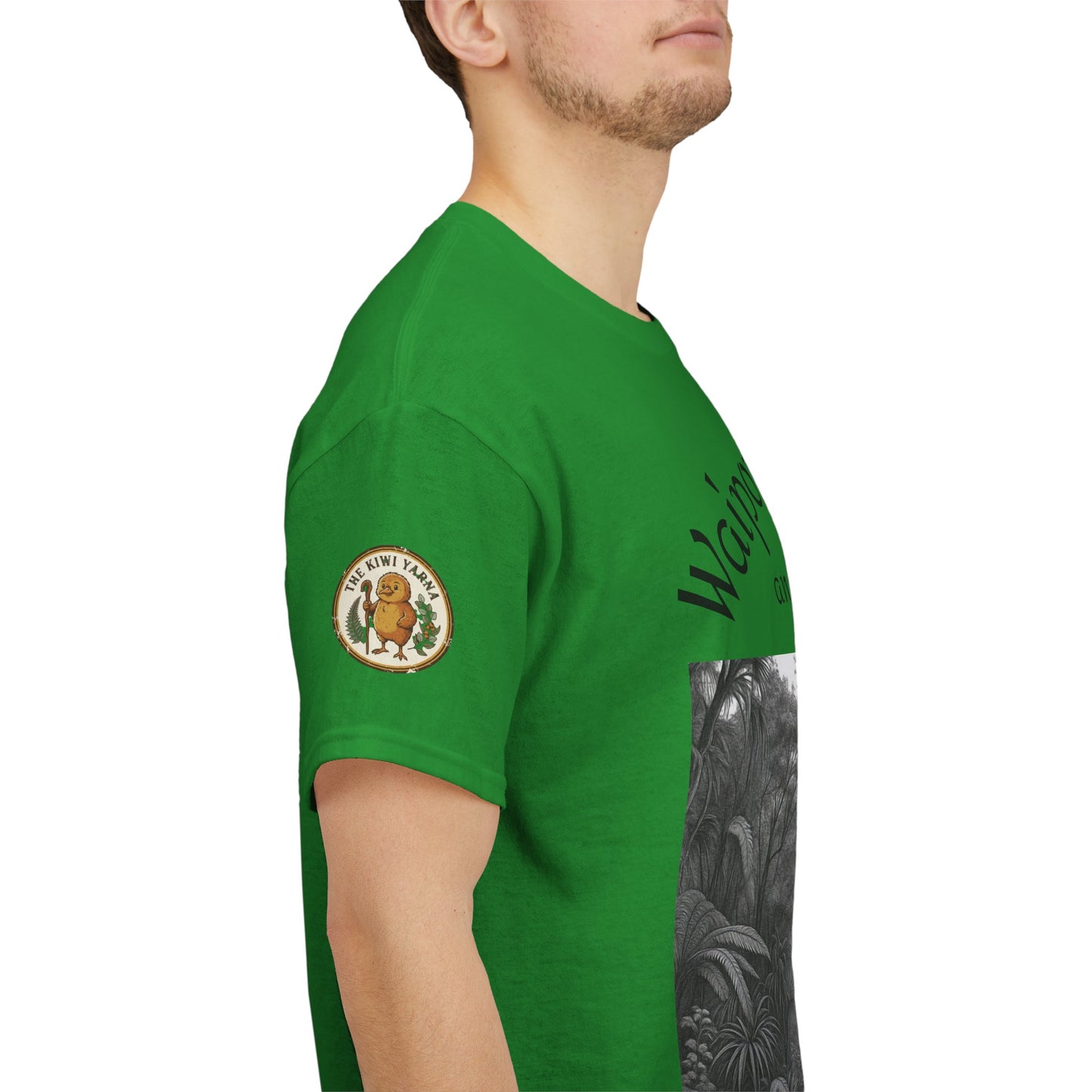 Green T-shirt with circular sleeve patch logo and forest graphic panel, side view