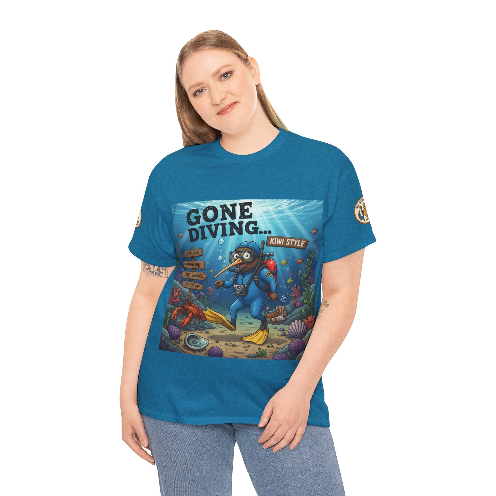 Teal T-shirt on person with scuba diver graphic and crew neck