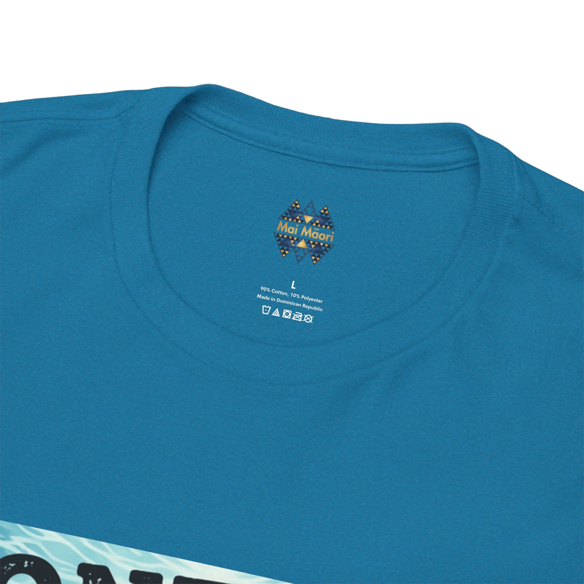 Teal T-shirt close-up of small chest label and crew neckline