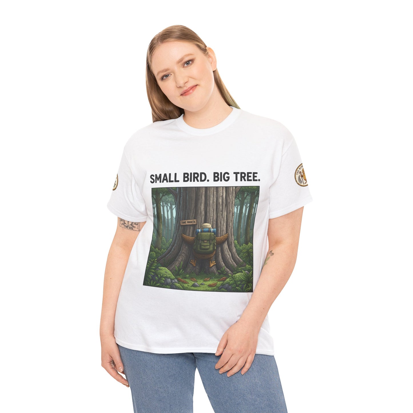 White T-shirt on model with front forest scene graphic and headline text