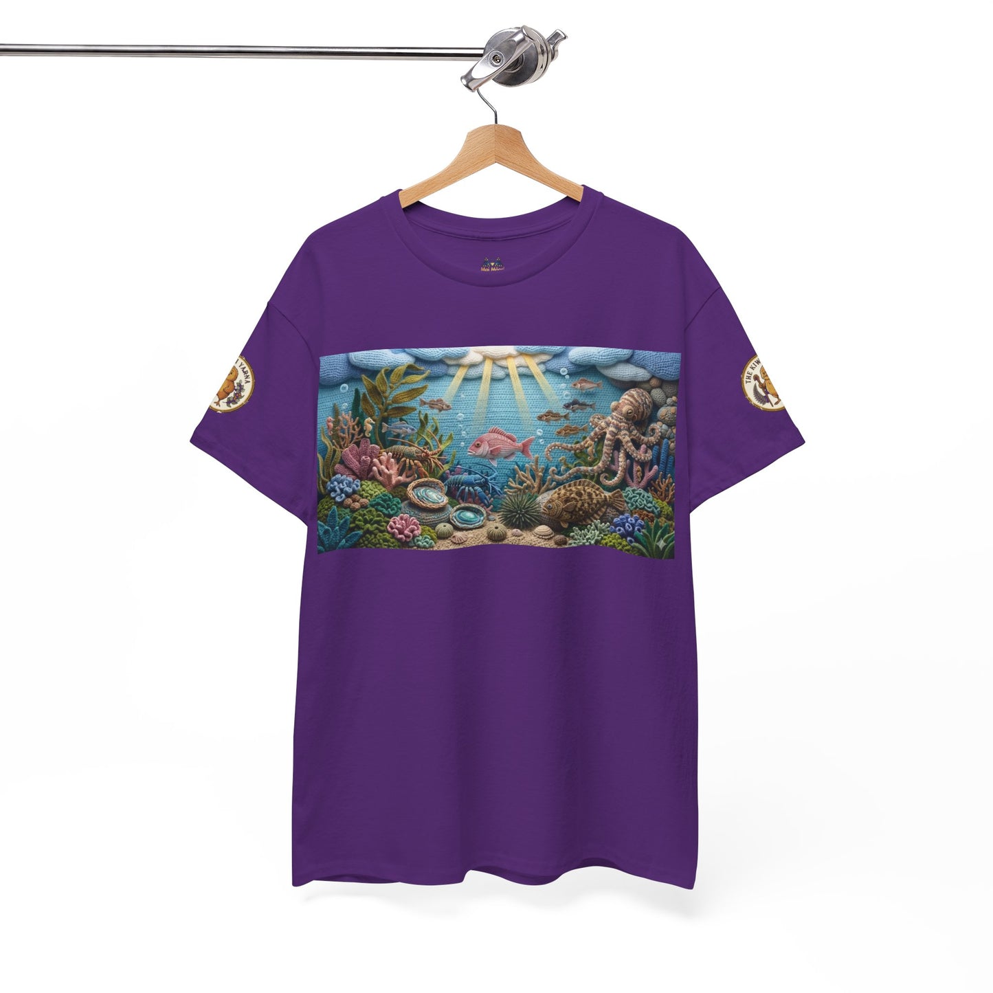 Purple crewneck T-shirt with ocean scene graphic panel and small sleeve patches