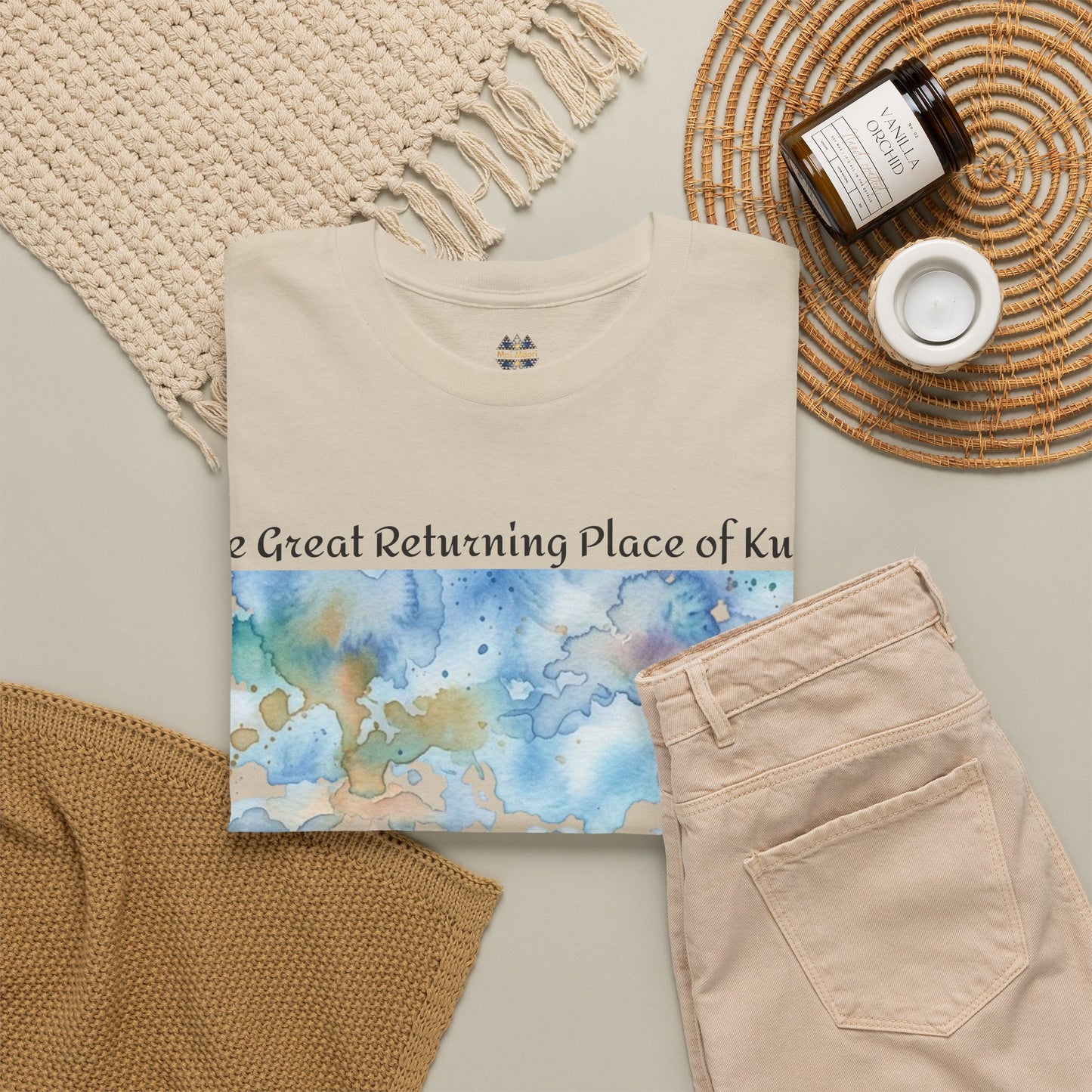 Beige graphic T-shirt with watercolor map background print and front text