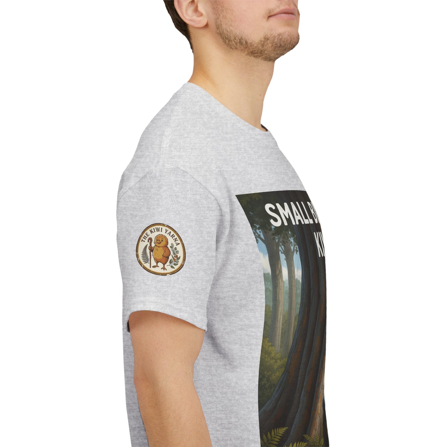 Heather gray T-shirt with sleeve patch and partial side view of large front forest graphic