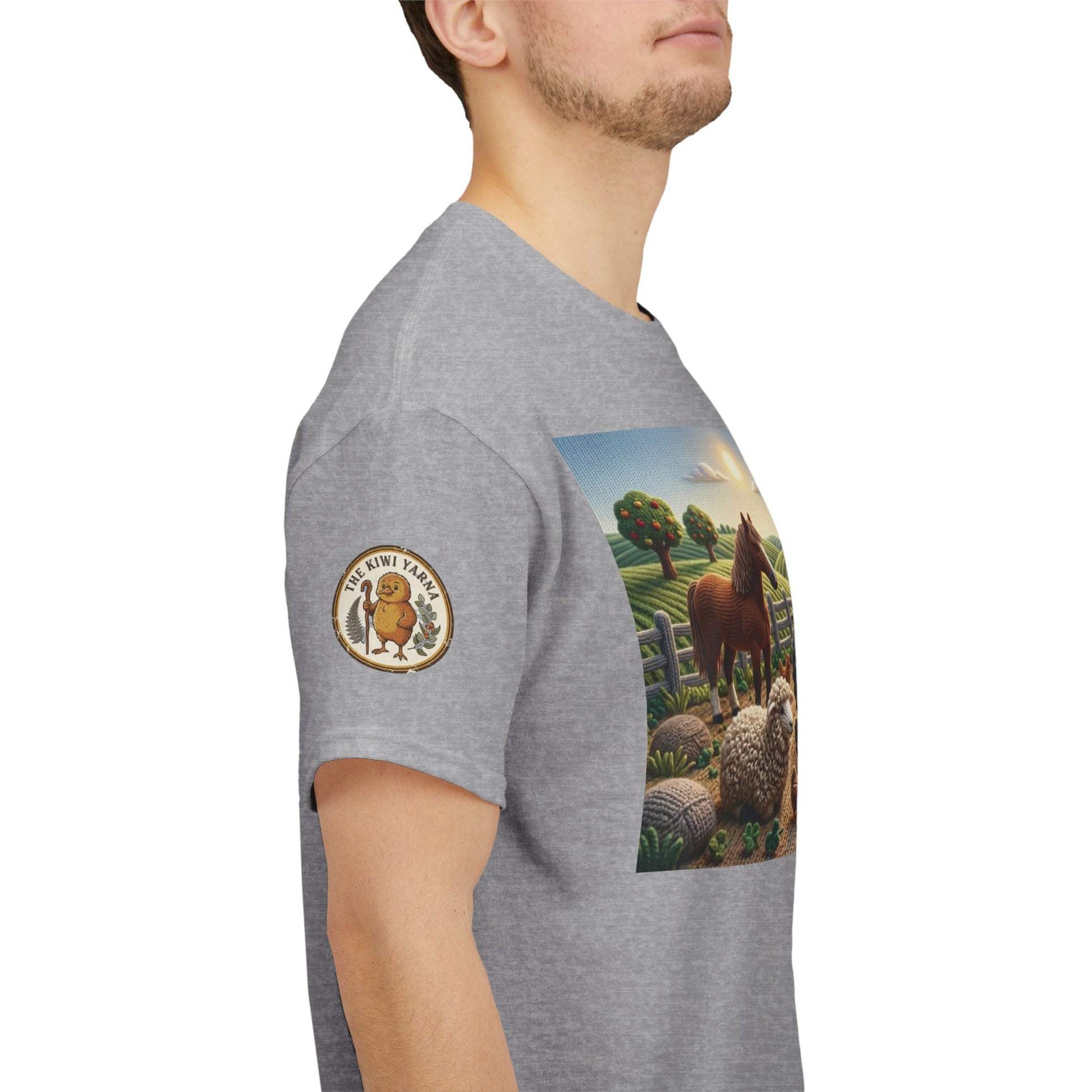 Heather gray T-shirt on side view with round sleeve logo patch and farm graphic panel.