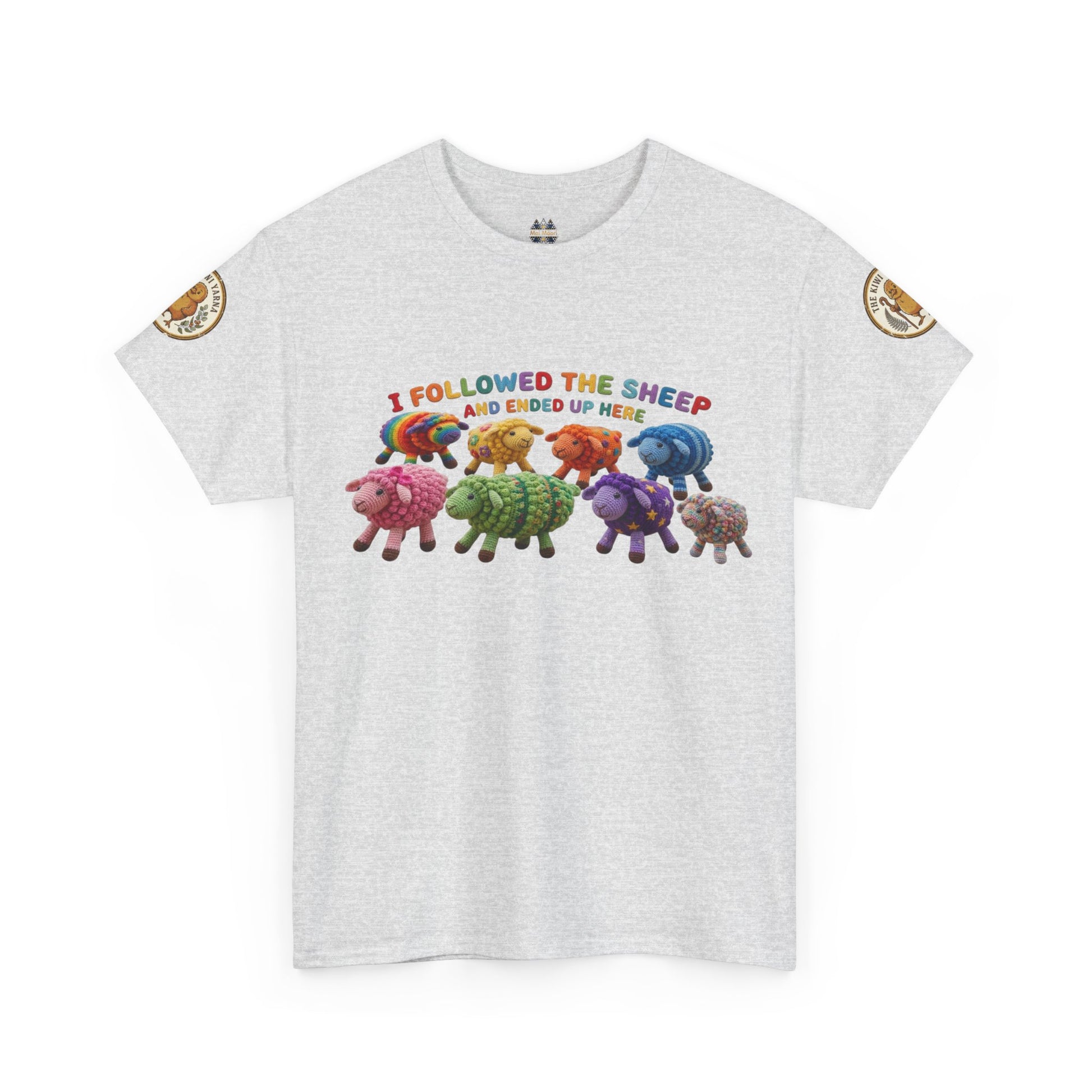 Light gray crew-neck graphic T-shirt with colorful sheep crowd print and small circular sleeve badges
