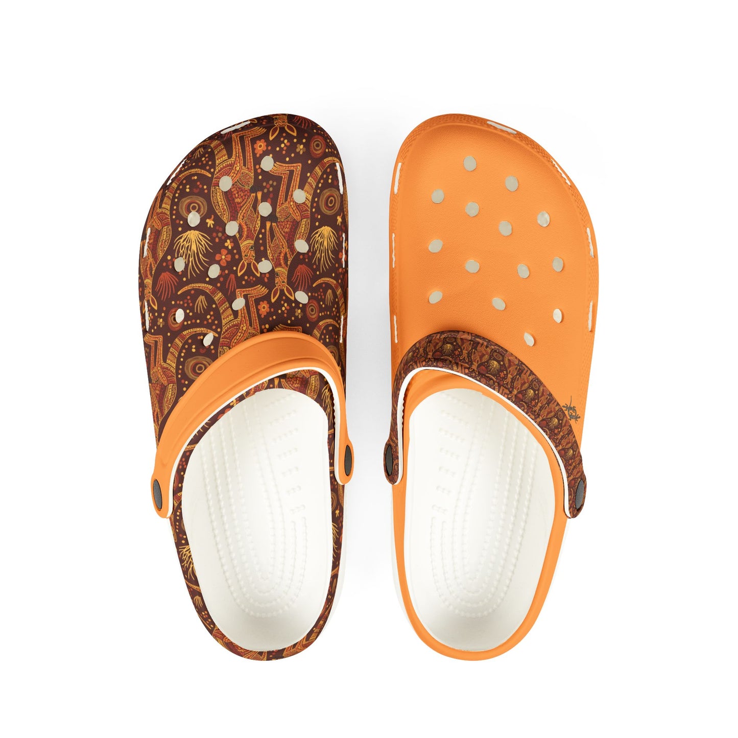 Pair of slip-on clogs, patterned brown and orange uppers, white footbeds, perforations