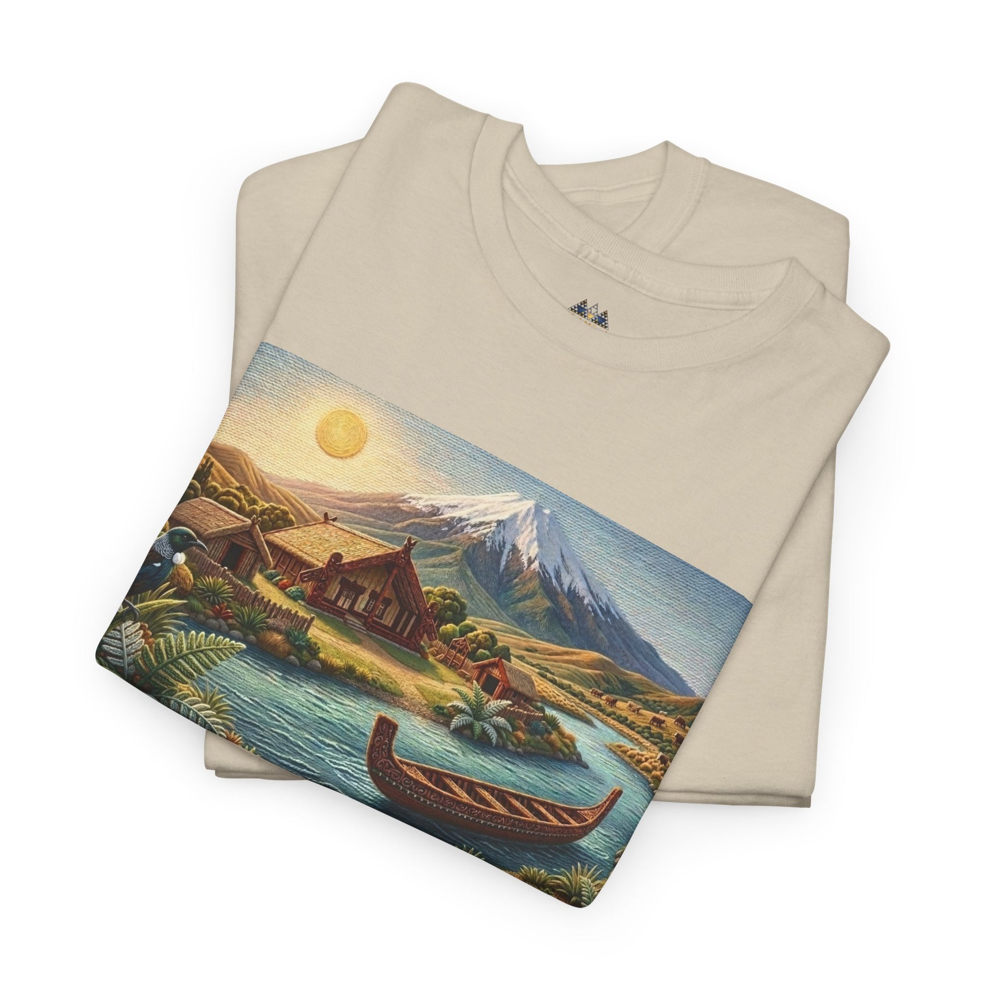 Folded cream graphic t-shirt with landscape print across the front, crew neckline