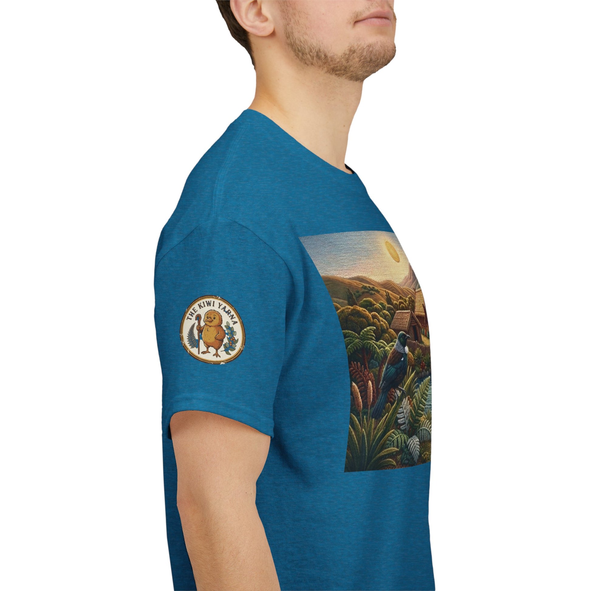 Teal short-sleeve T-shirt side view with landscape graphic and sleeve emblem patch