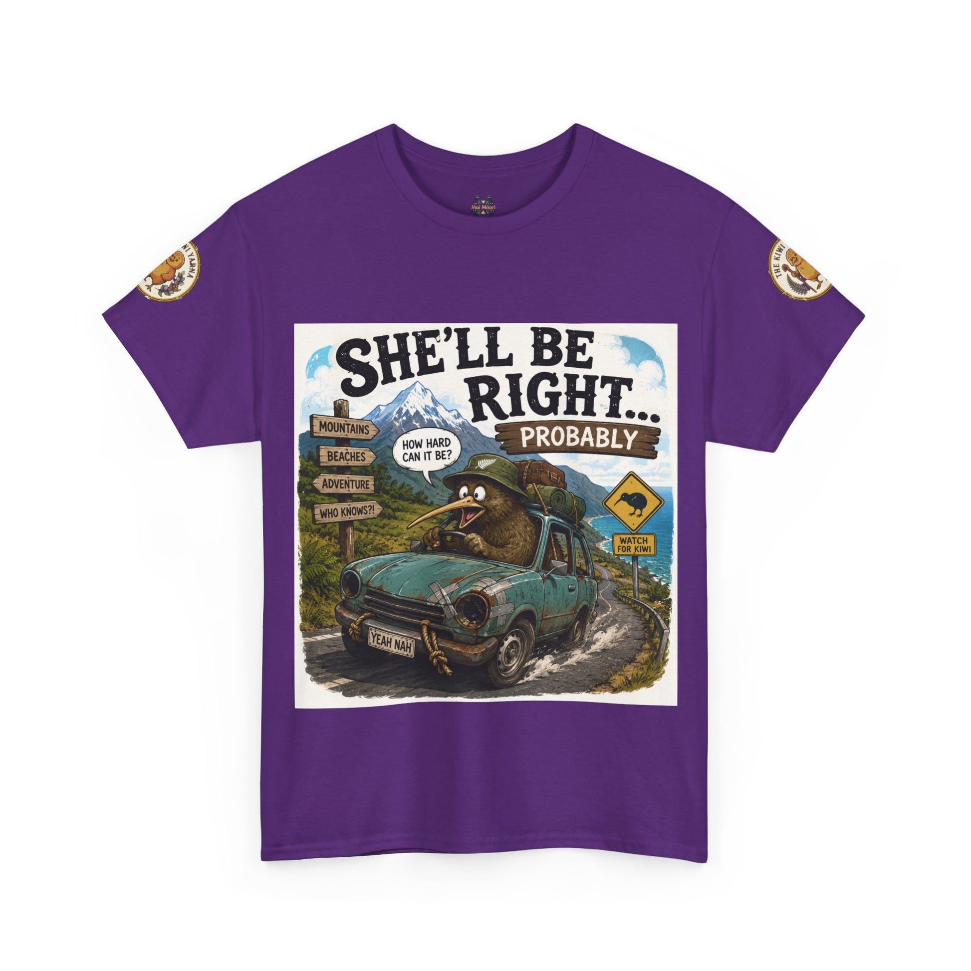 Purple graphic crewneck T-shirt with “She’ll Be Right.. Probably” front print and circular sleeve logos.