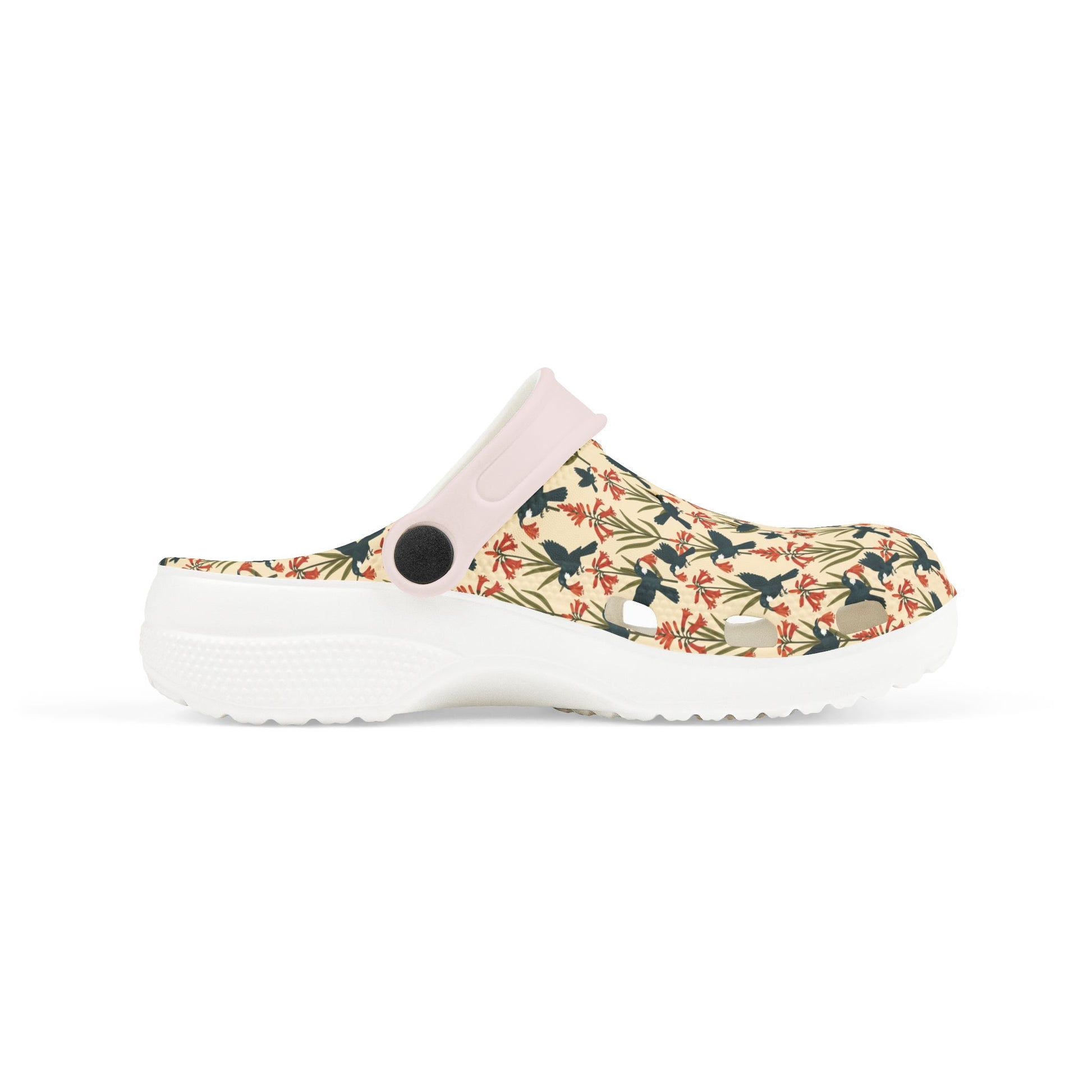 Kids slip-on clog shoes with floral print and perforated vents, light pink collar, white sole.