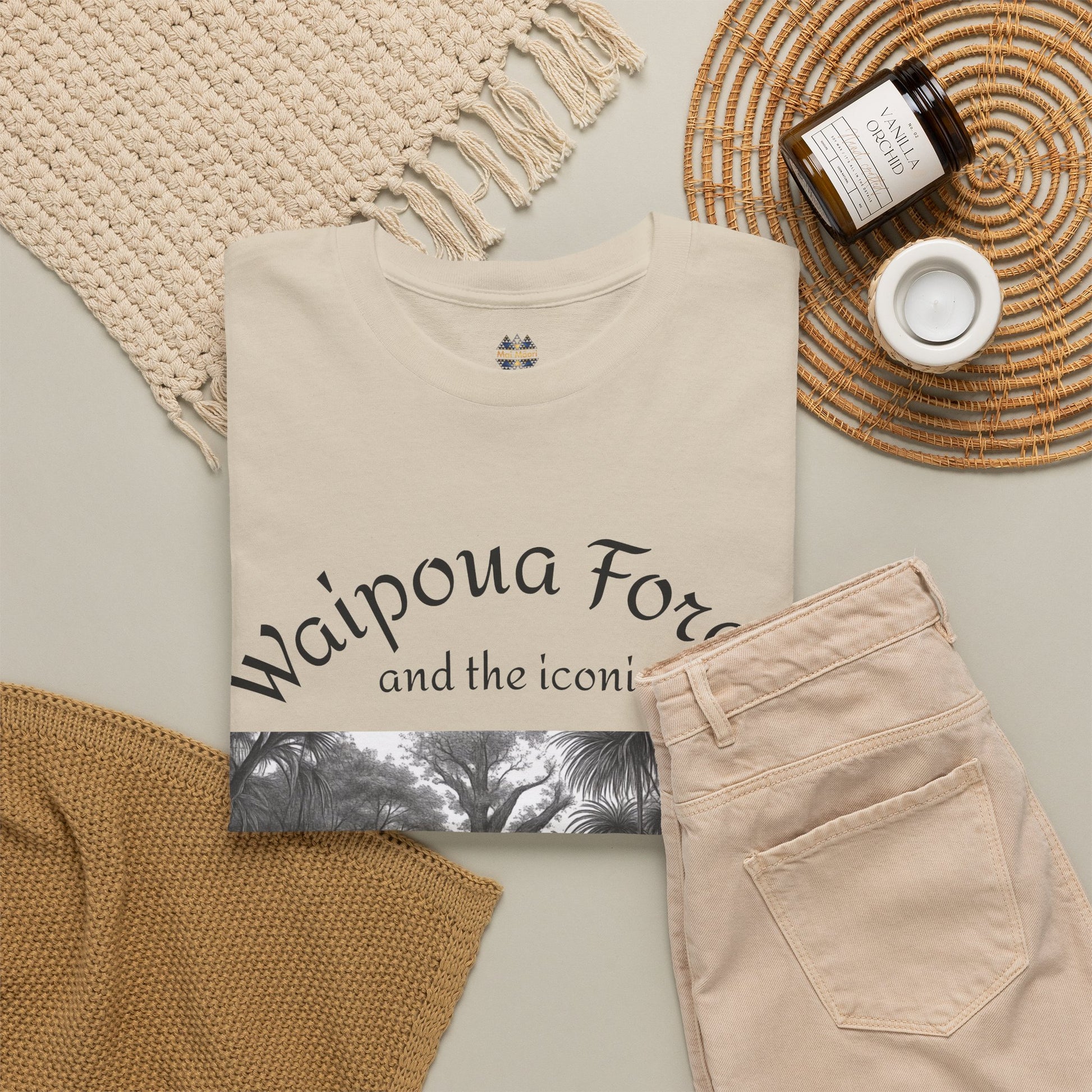Cream T-shirt with cursive Waipoua text and grayscale forest photo graphic at the bottom