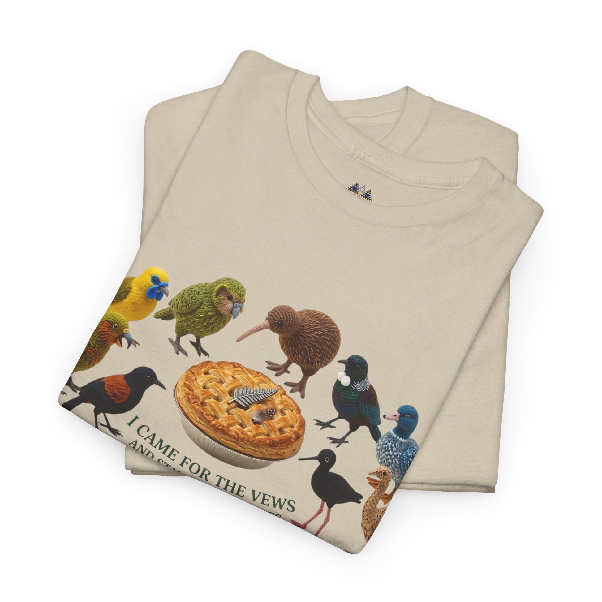 Natural T-shirt with colorful bird and pie graphic, front design with small text.