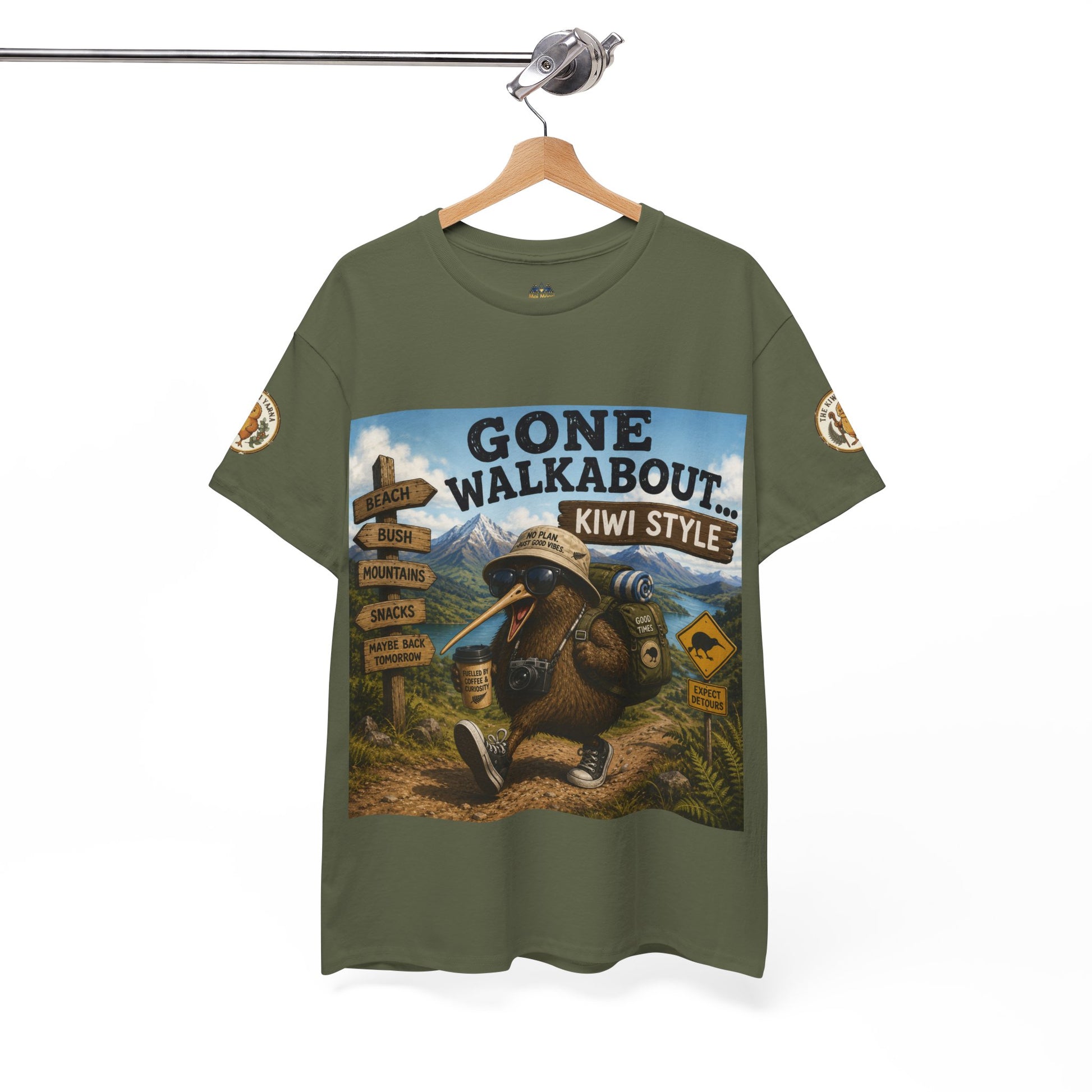 Olive-green graphic T-shirt on hanger, 'Gone Walkabout Kiwi Style' front artwork