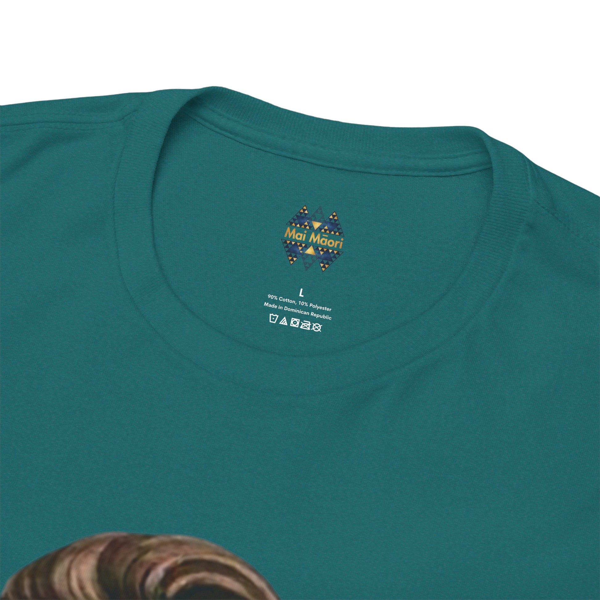 Teal crew-neck T-shirt with small chest logo and partial woman portrait print at collar