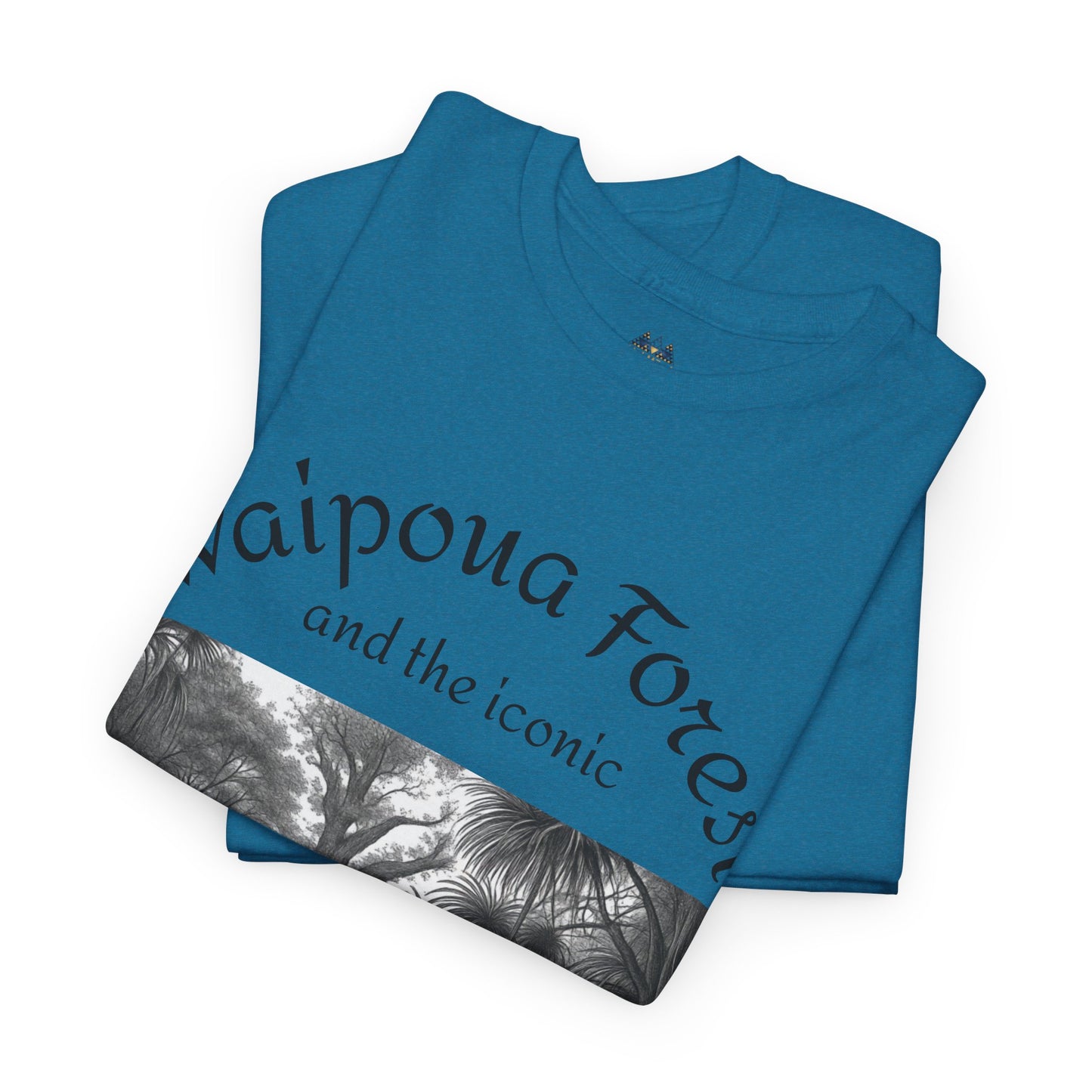 Blue T-shirt folded showing large diagonal forest graphic print across chest
