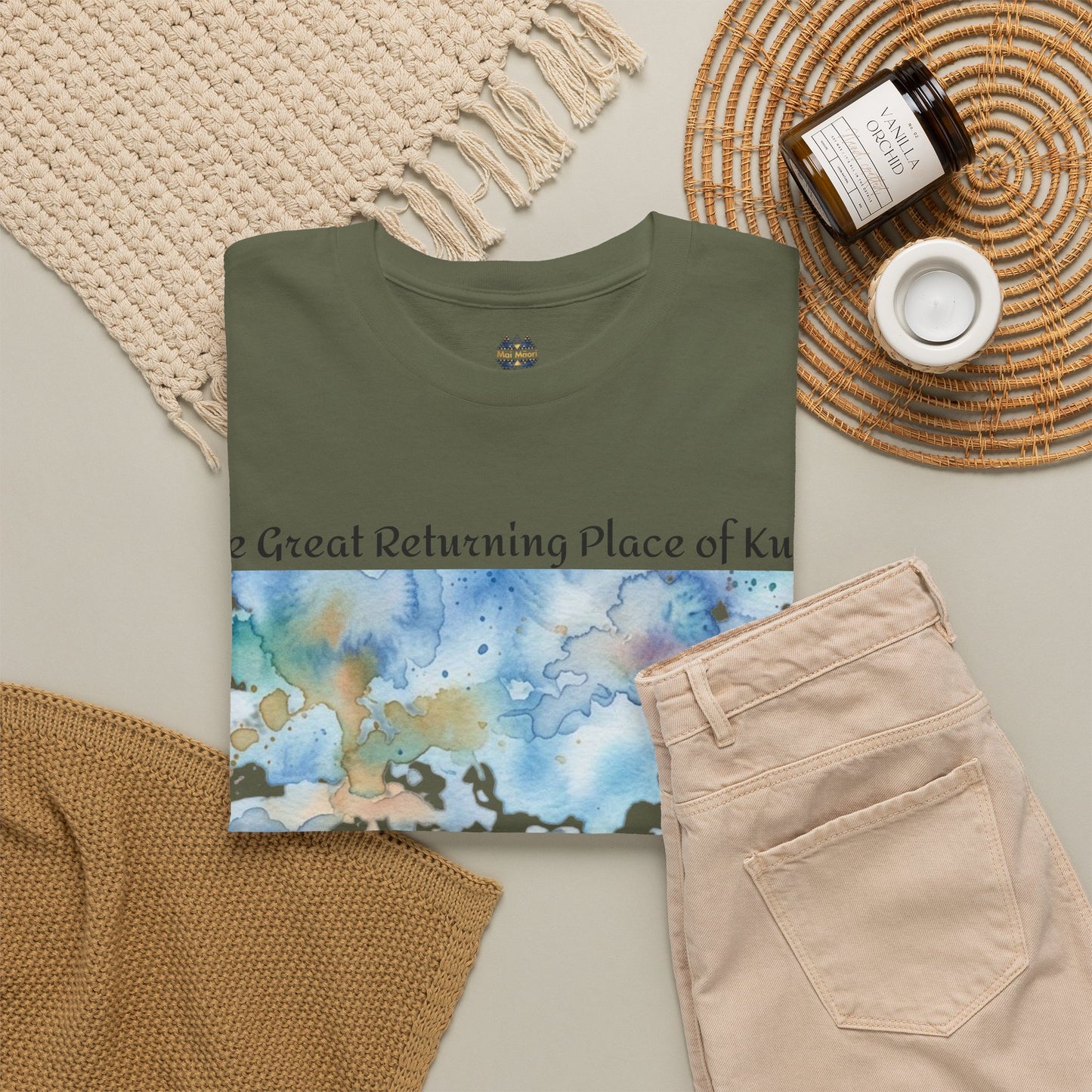 Olive green graphic T-shirt with blue landscape print and crew neckline