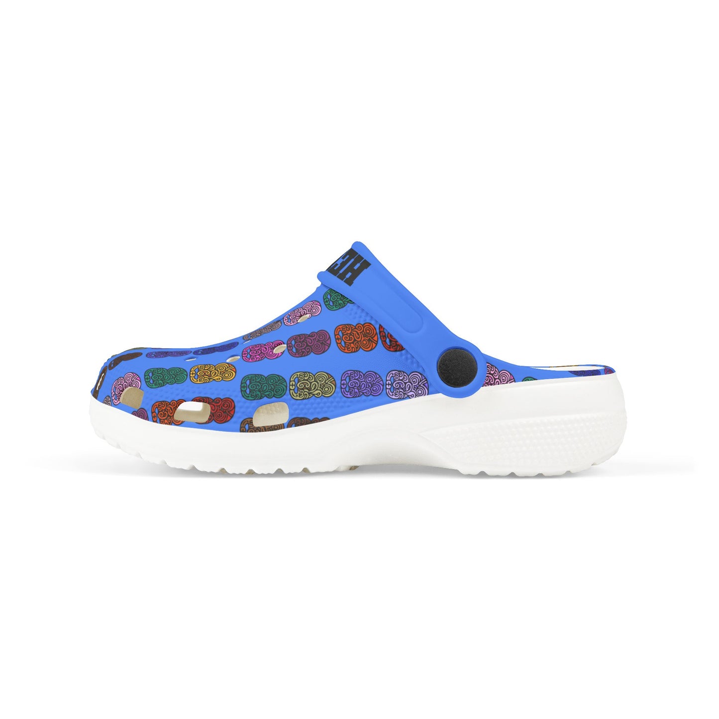 Kids clog-style casual shoe with blue multicolor tiki pattern, white sole and back strap