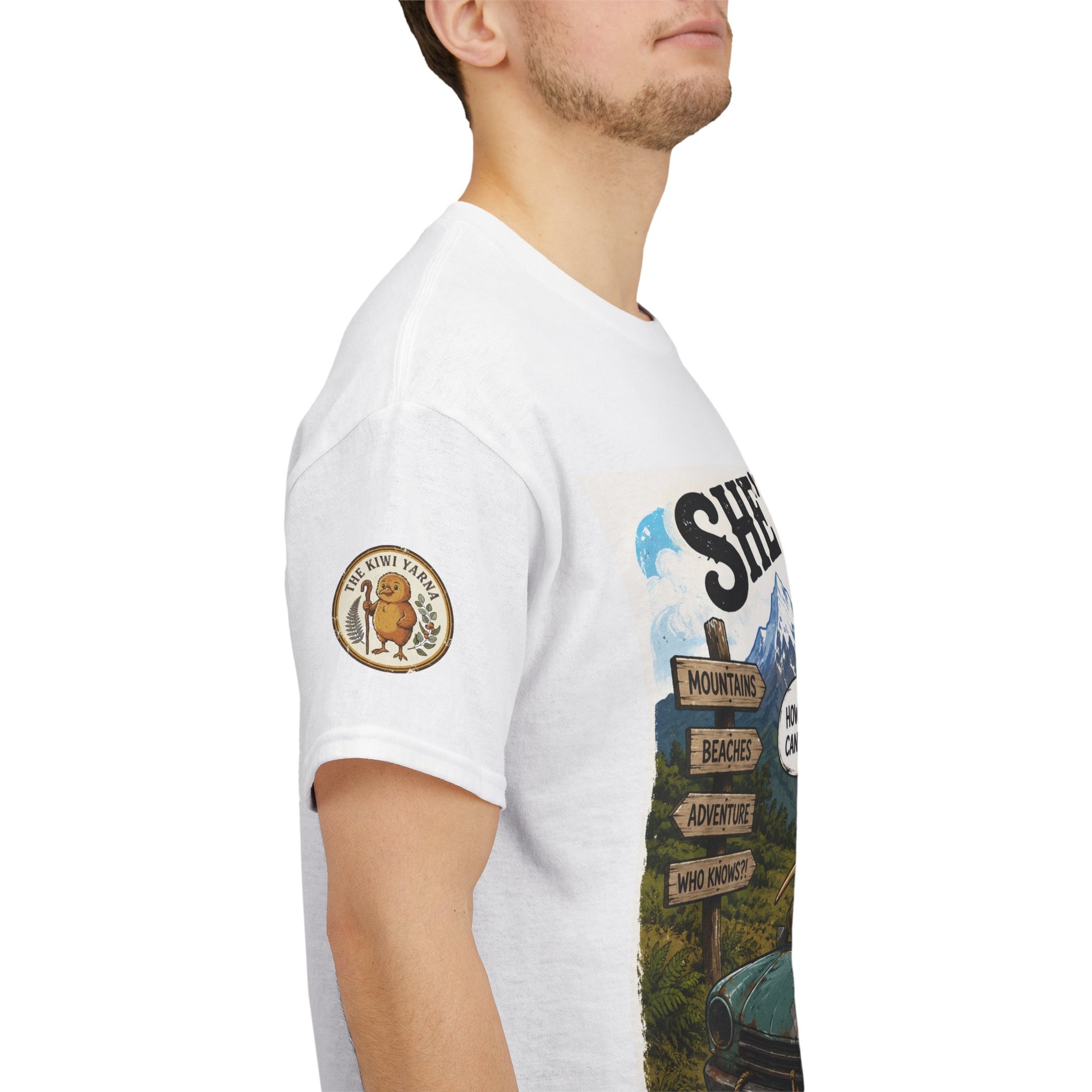 White graphic T-shirt with circular sleeve patch and illustrated outdoor scene on side