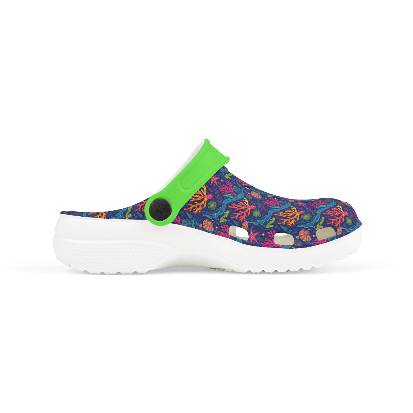 Side view of patterned slip-on clog with green strap and white cushioned outsole.