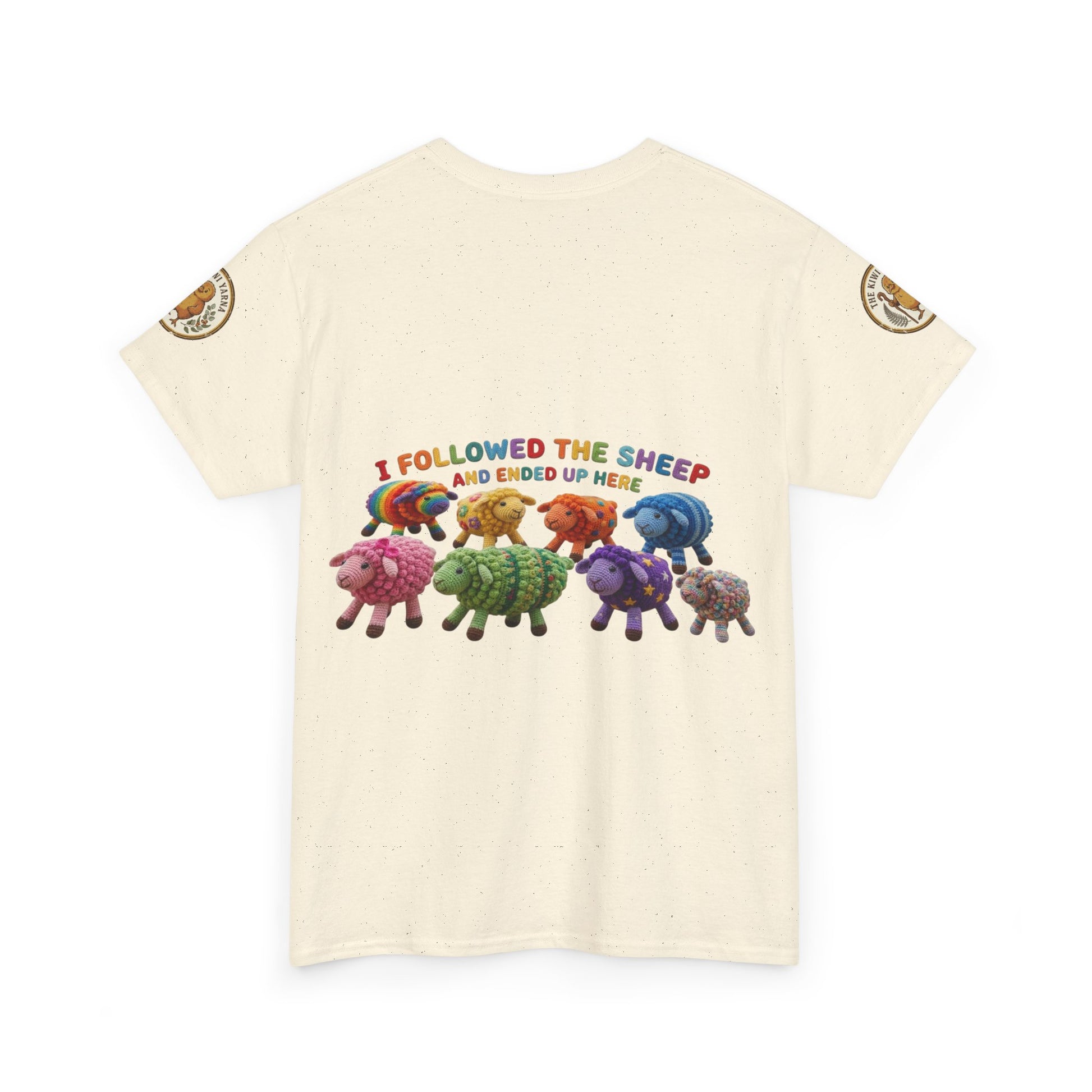Cream graphic crewneck T-shirt with colorful sheep herd and “I followed the sheep” text.