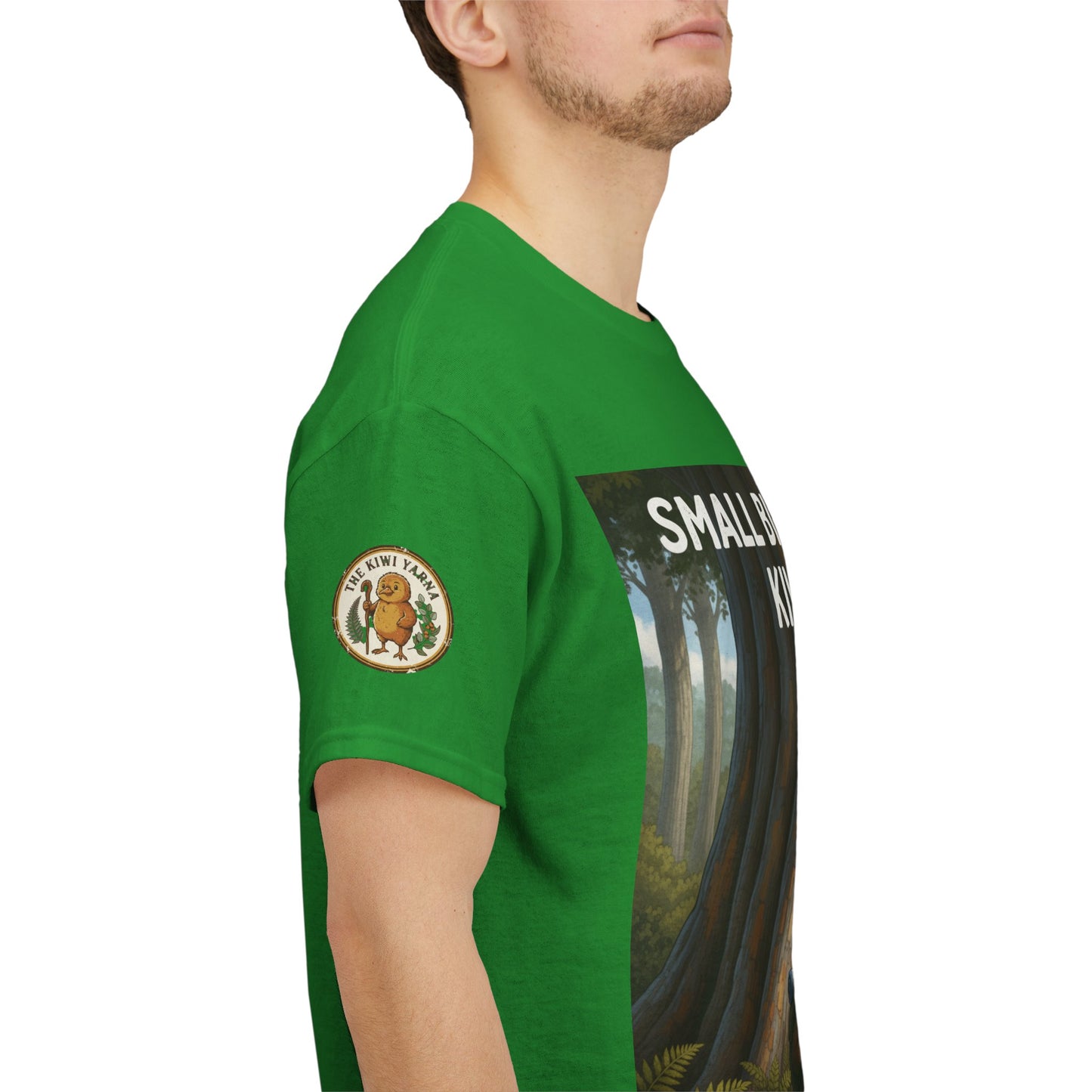 Green graphic T-shirt with sleeve logo patch and side woodland print
