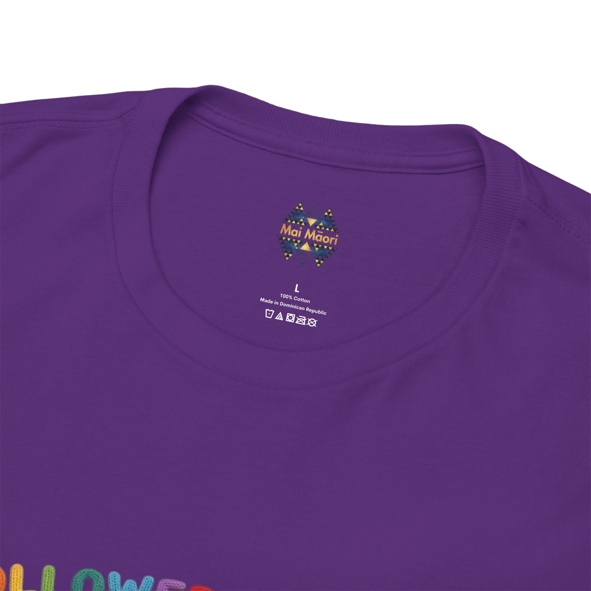 Purple t-shirt with small crest logo at chest and printed label near the neckline.