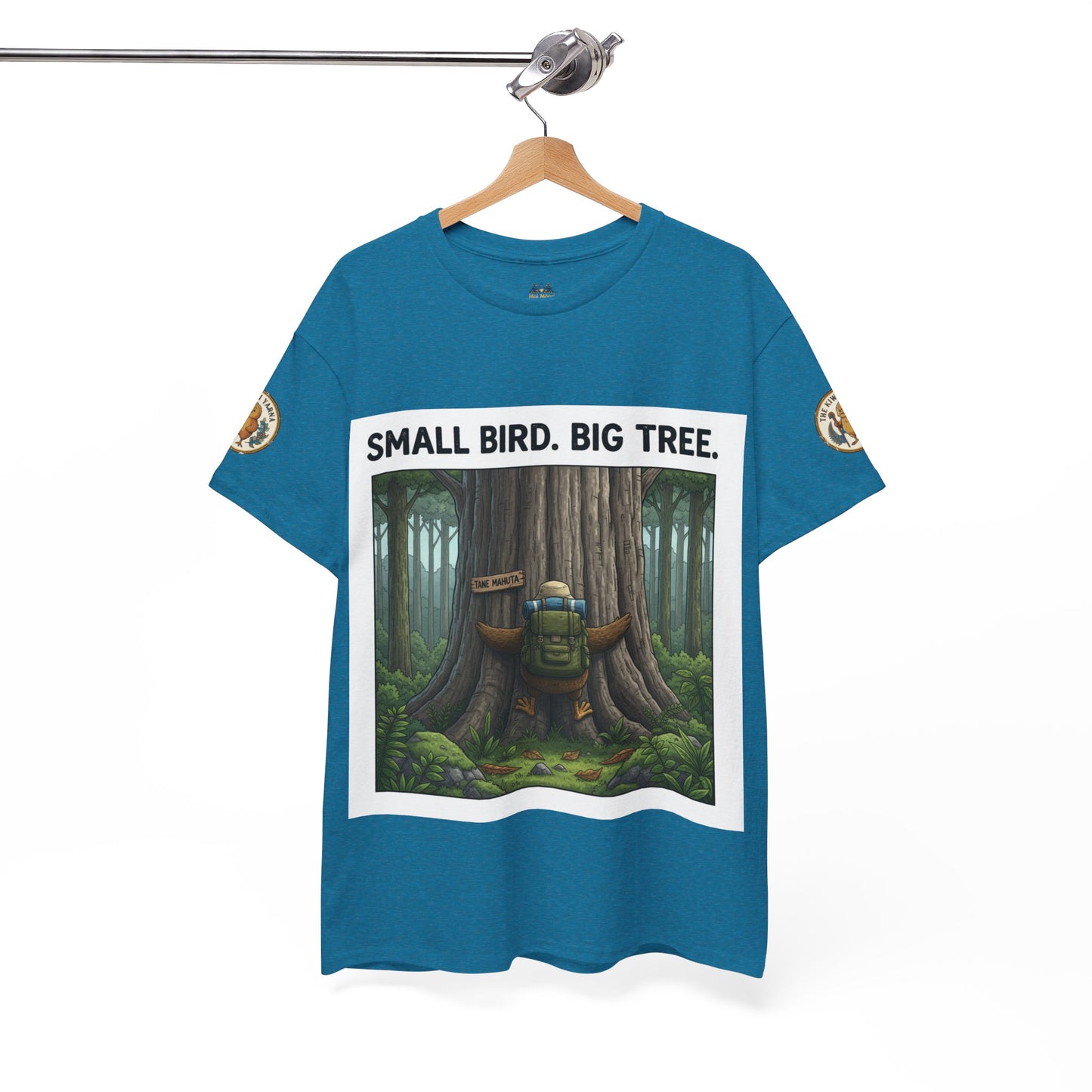 Teal T-shirt on hanger with "SMALL BIRD. BIG TREE." front graphic