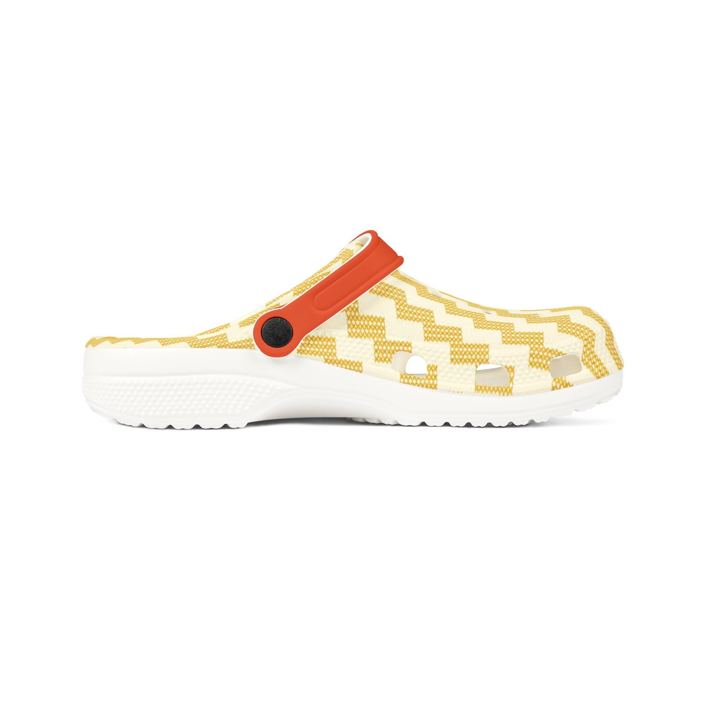 Poutama clogs side view with yellow zigzag upper, orange strap, and white outsole