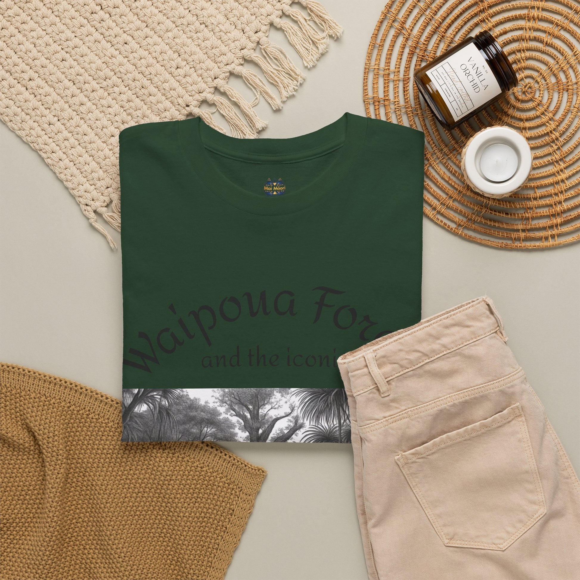 Dark green T-shirt with layered forest graphic and small chest logo