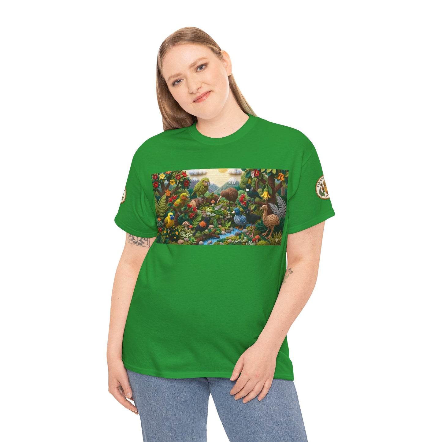 Green bird-graphic T-shirt worn by model, short sleeves and crew neckline.