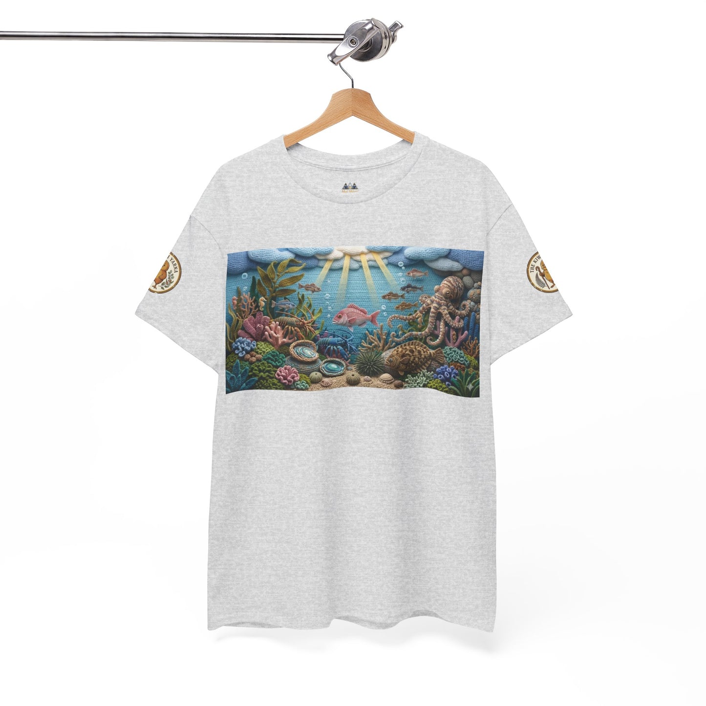 Light gray T-shirt on hanger with rectangular ocean scene print