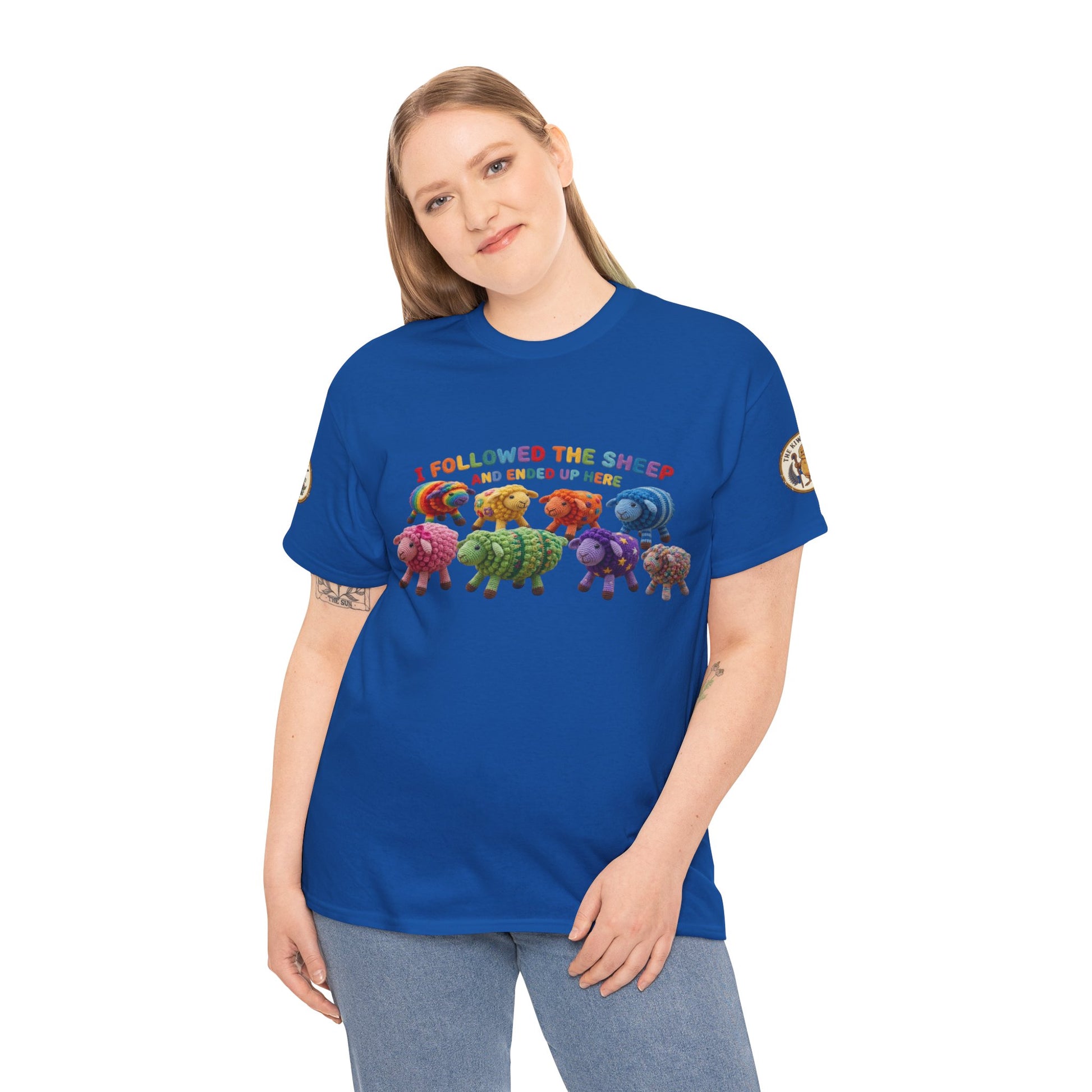 Royal blue short-sleeve T-shirt with colorful sheep graphic worn by a model
