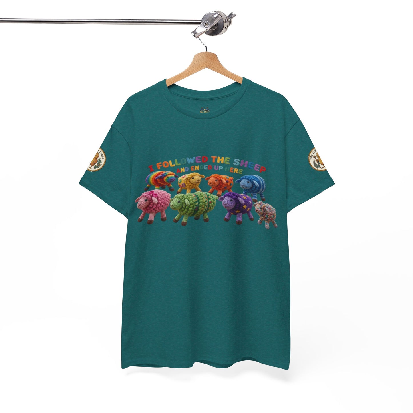 Teal crewneck T-shirt on hanger with sheep graphic and colorful text banner