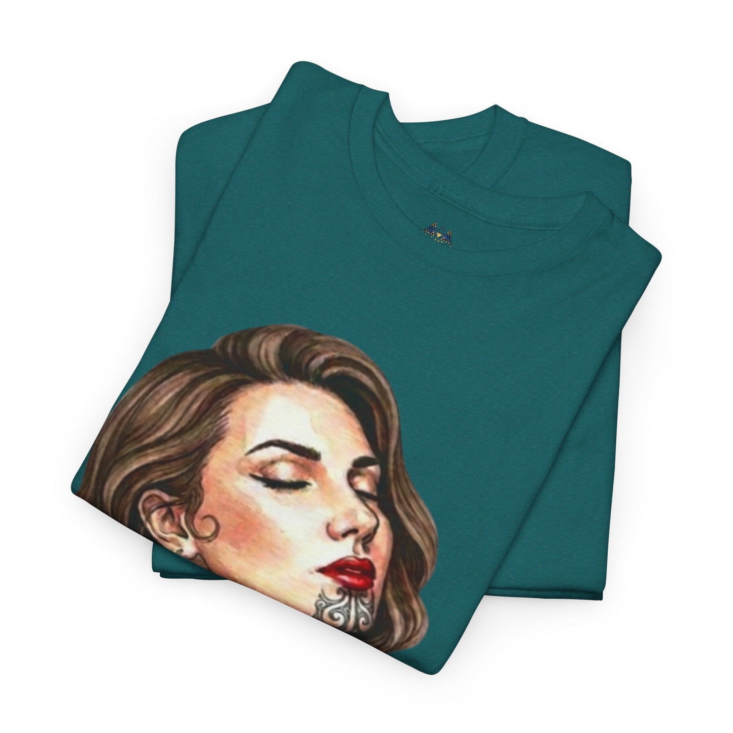Teal crew-neck graphic T-shirt folded with close woman portrait print on the front