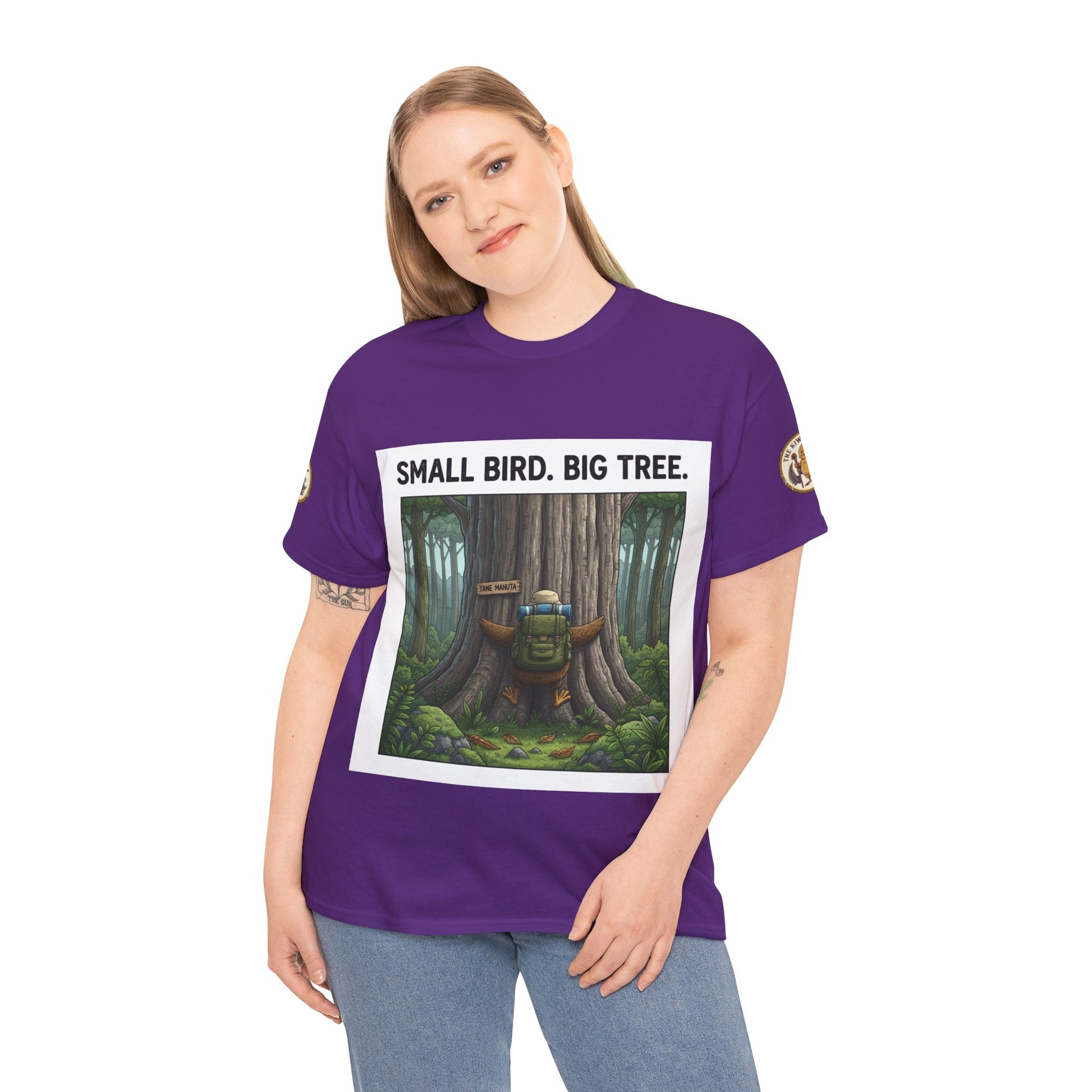 Purple graphic t-shirt on model with front tree scene print
