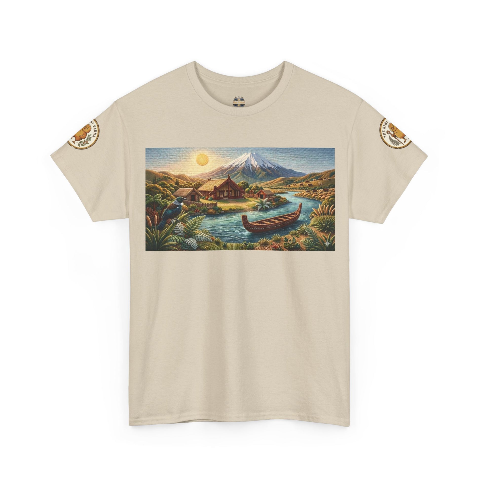 Beige graphic T-shirt with landscape print and canoe; circular sleeve patches.