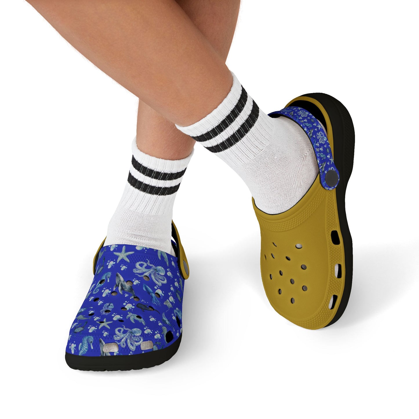 Kids' sea-themed clogs worn with striped white socks; blue print and yellow base
