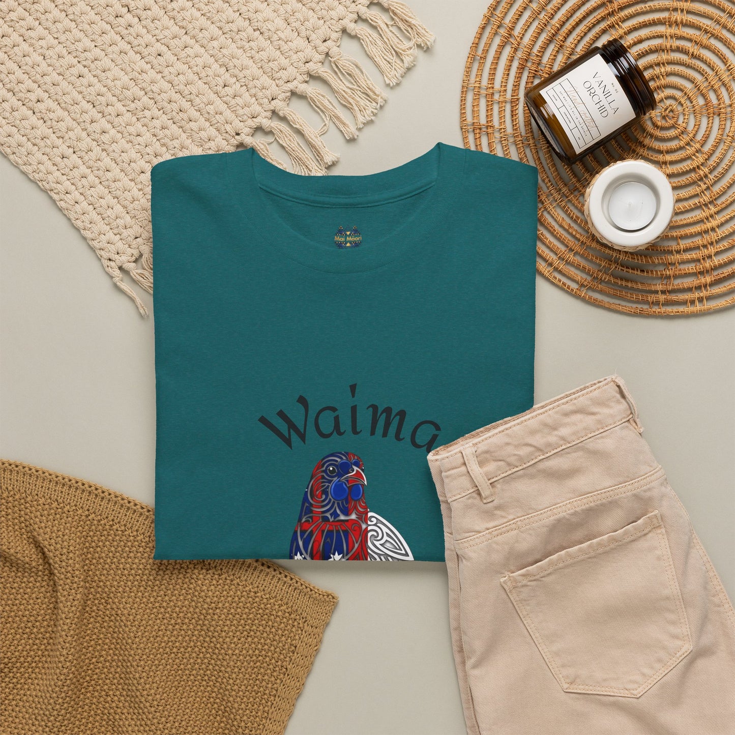 T-shirt with Waima Tuhirangi Marae and Church graphic in teal