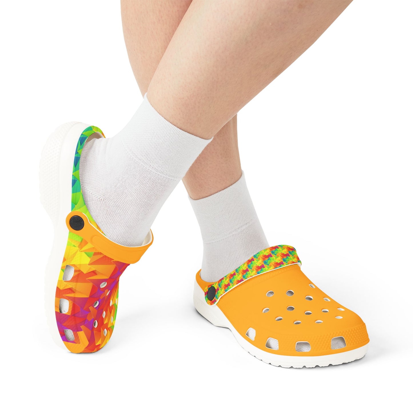 Clog shoes worn with white crew socks, orange upper and multicolor geometric strap