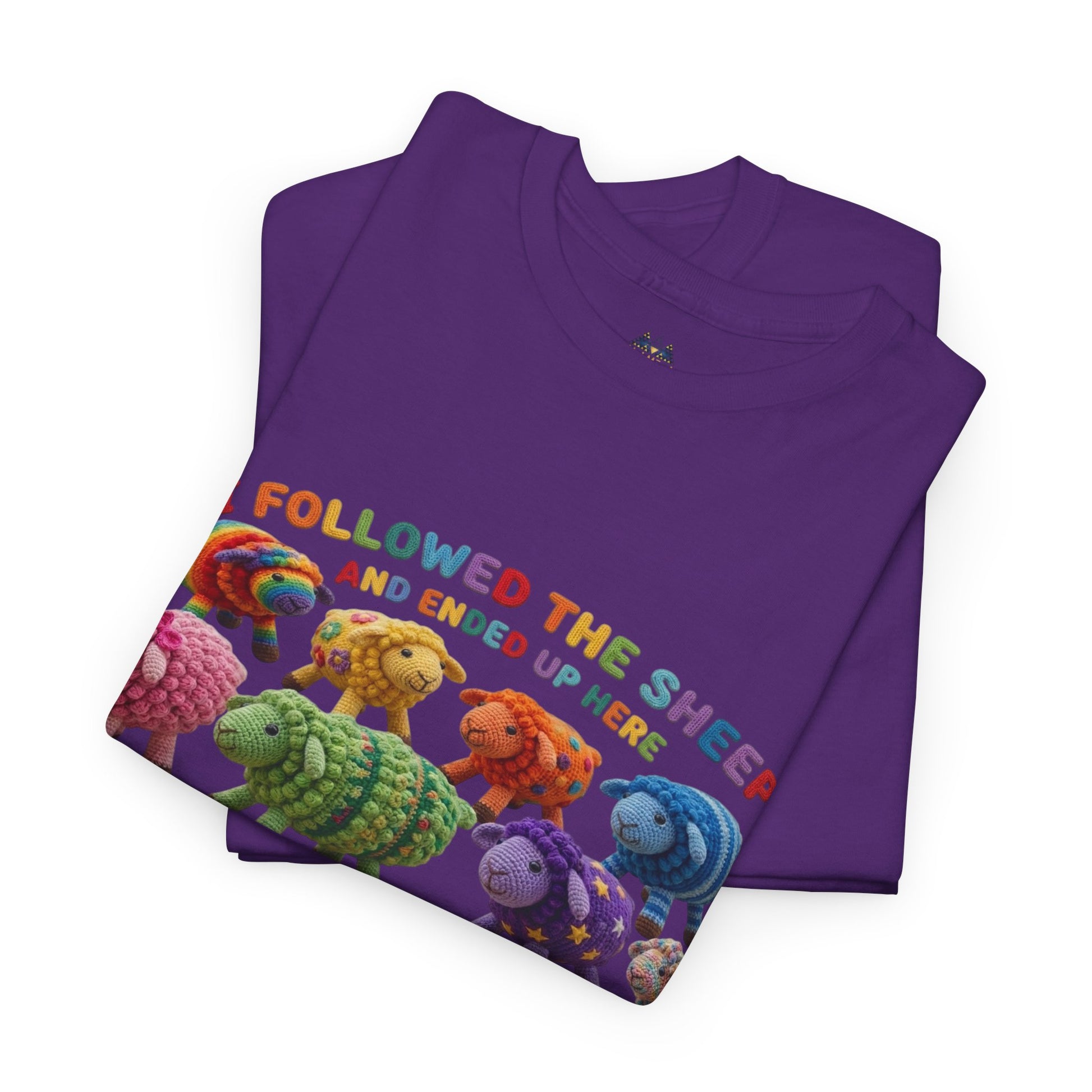 Purple crewneck t-shirt with colorful sheep lineup and multicolor text across front.