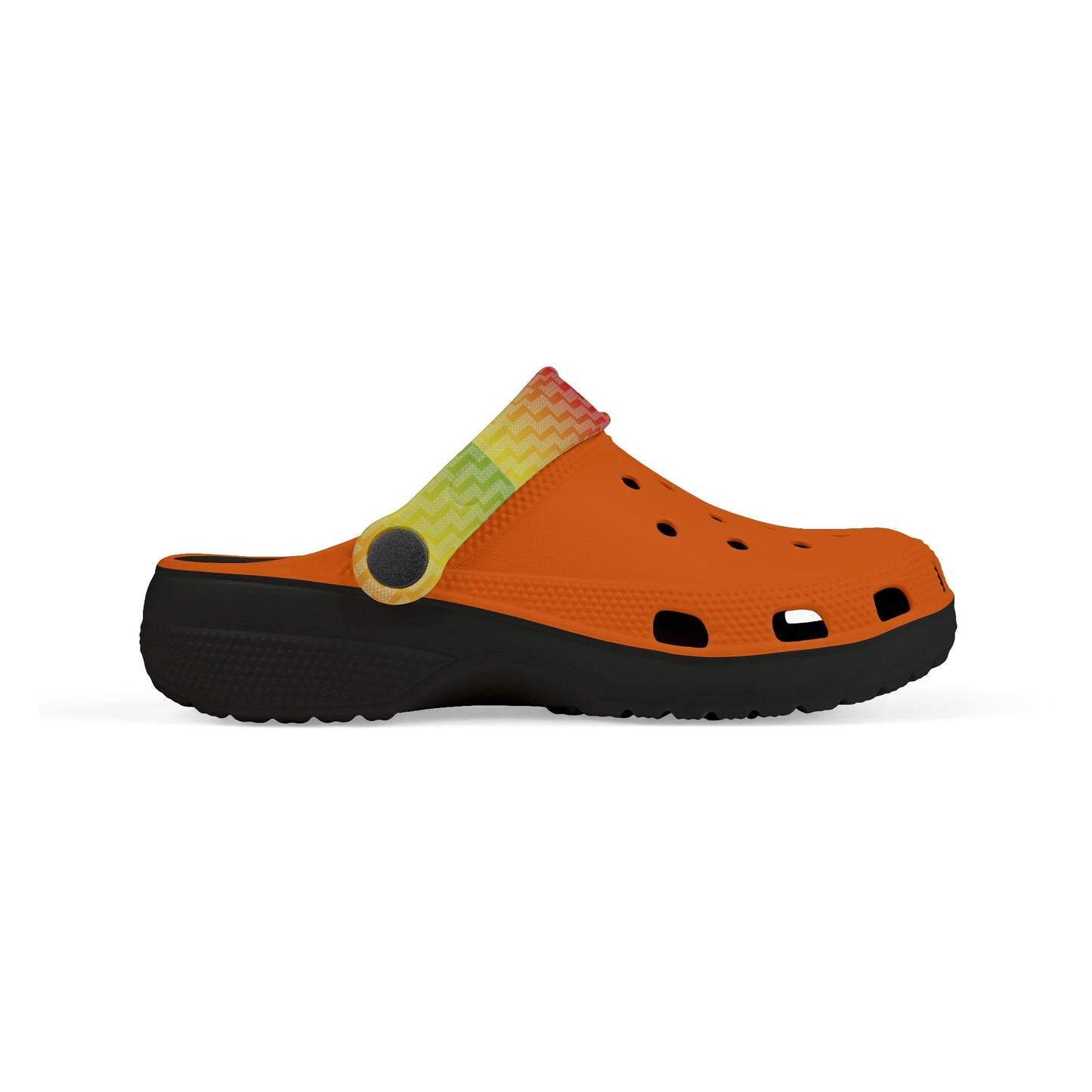 Orange and lime clogs with zigzag upper, perforations, black sole, and top strap.